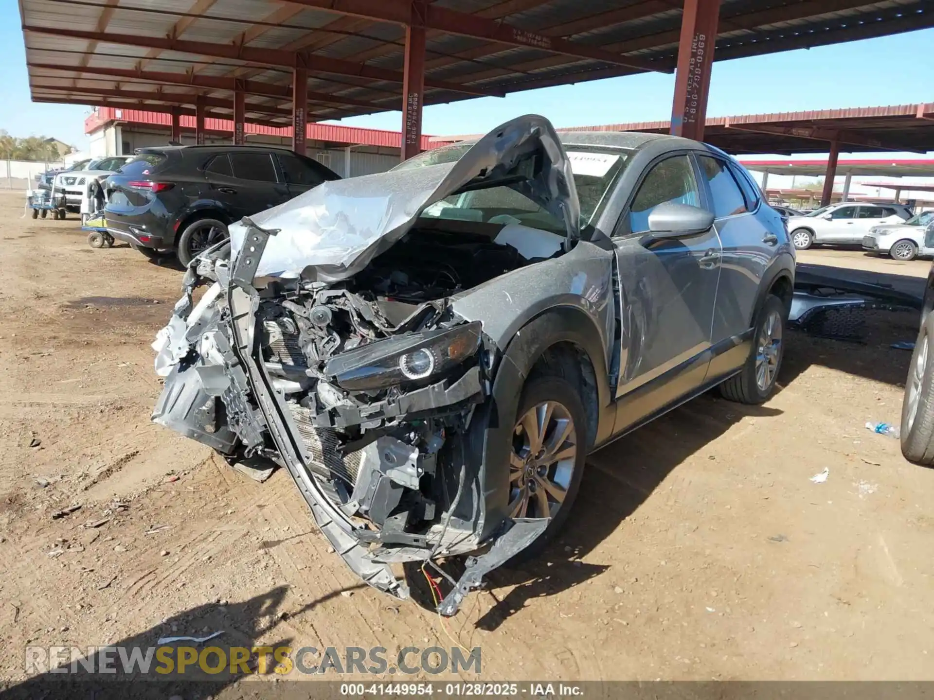 2 fotografías del automóvil dañado 3MVDMABL2MM242082 MAZDA CX-30 2021