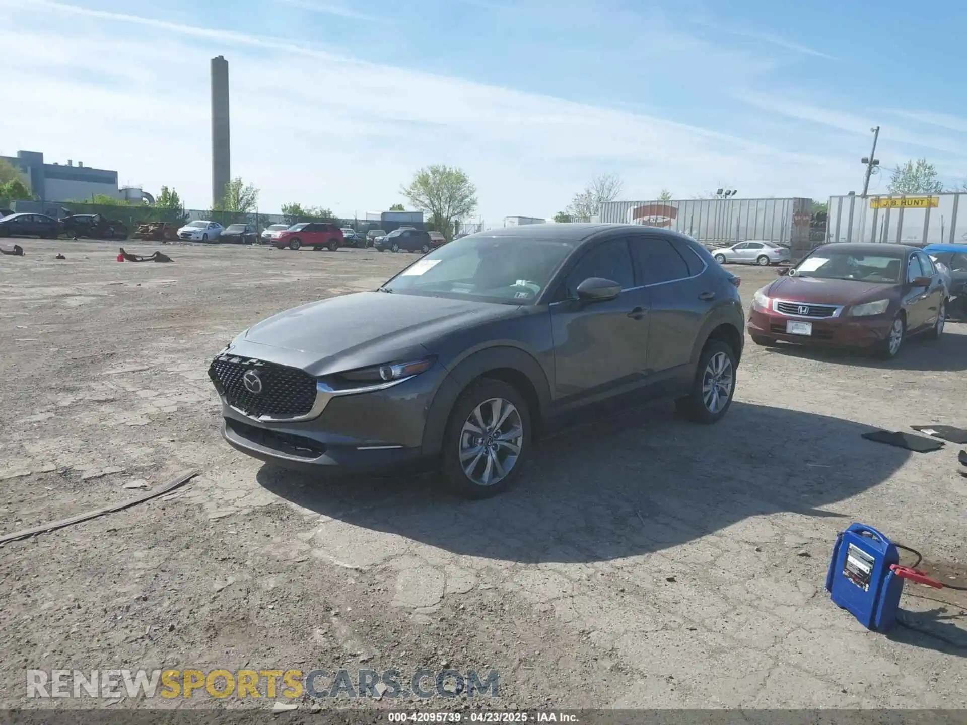 2 fotografías del automóvil dañado 3MVDMBCL1MM210003 MAZDA CX-30 2021