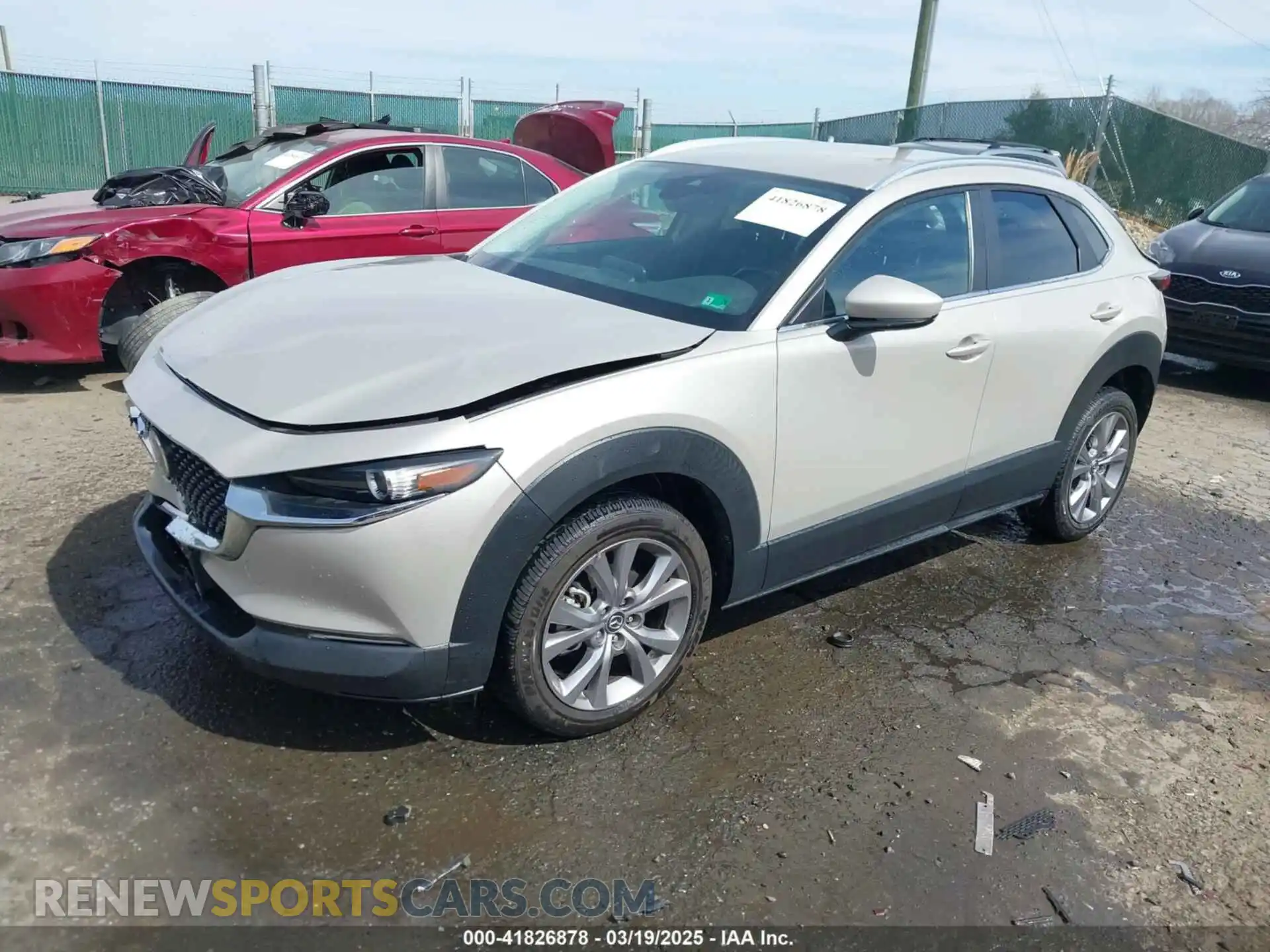 2 fotografías del automóvil dañado 3MVDMBBL4NM401563 MAZDA CX-30 2022