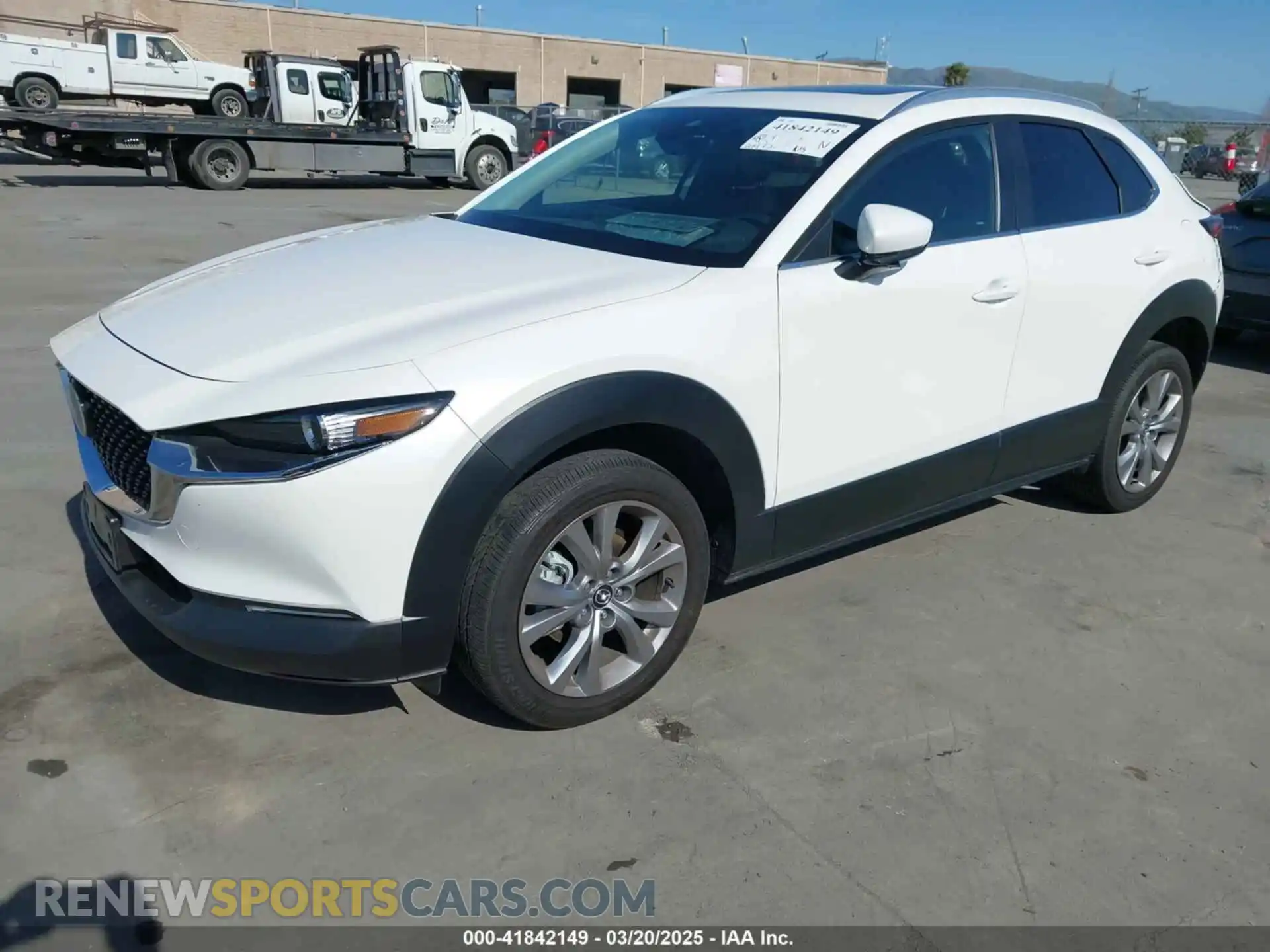 2 Photograph of a damaged car 3MVDMBCL2NM456849 MAZDA CX-30 2022