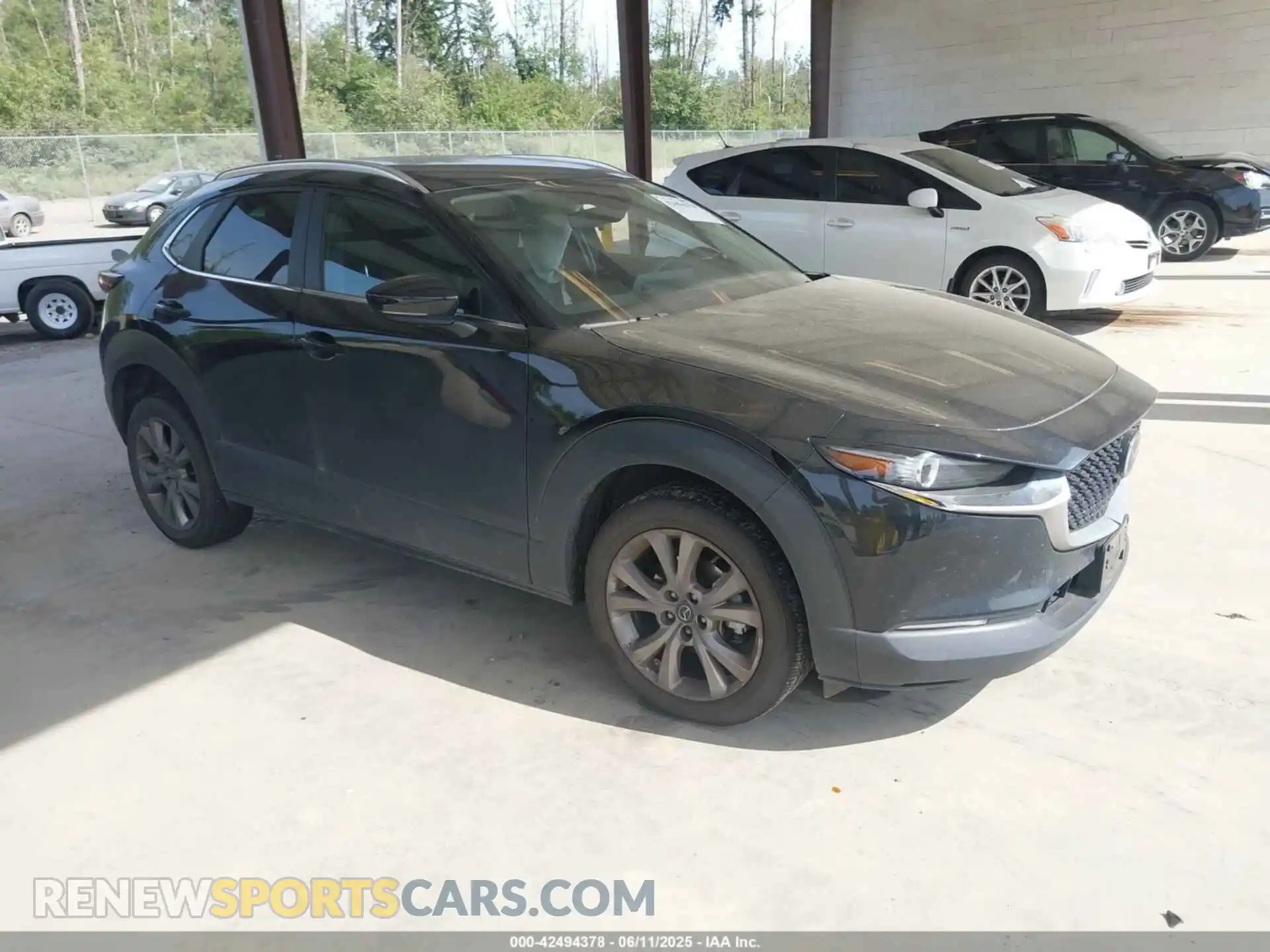 1 Photograph of a damaged car 3MVDMBCM8PM569152 MAZDA CX-30 2023