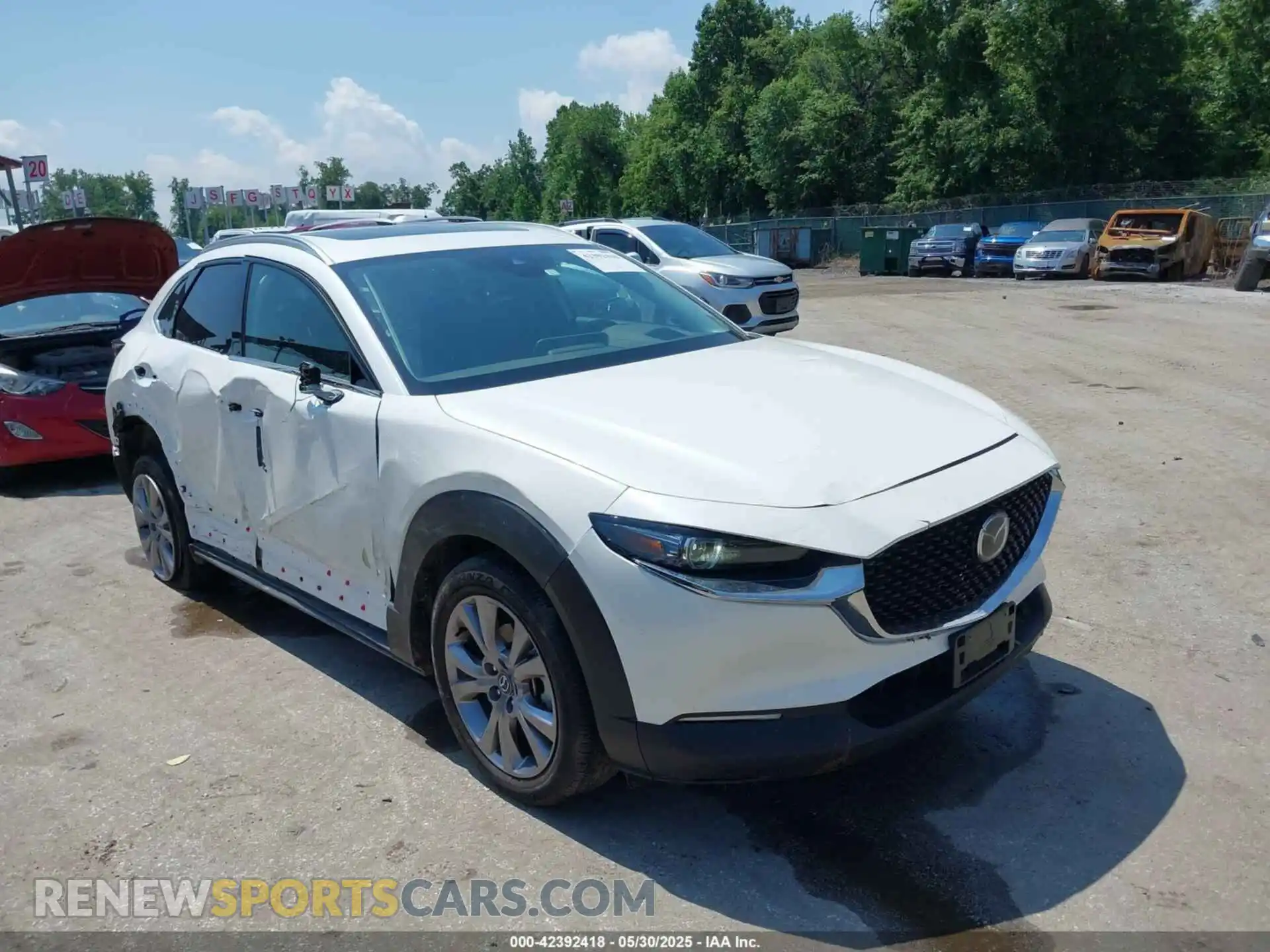 1 Photograph of a damaged car 3MVDMBDM2PM521810 MAZDA CX-30 2023