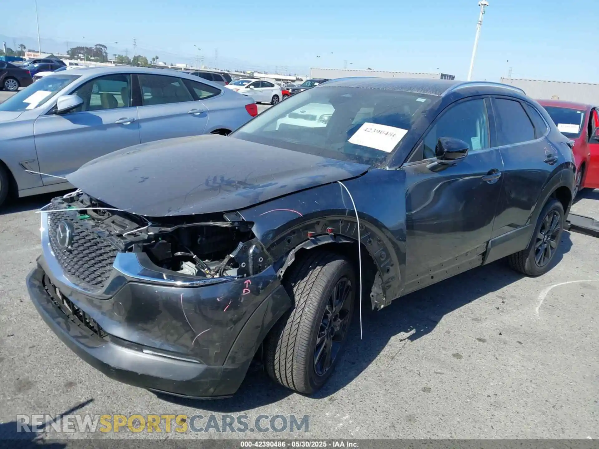 2 fotografías del automóvil dañado 3MVDMBBM8RM716638 MAZDA CX-30 2024