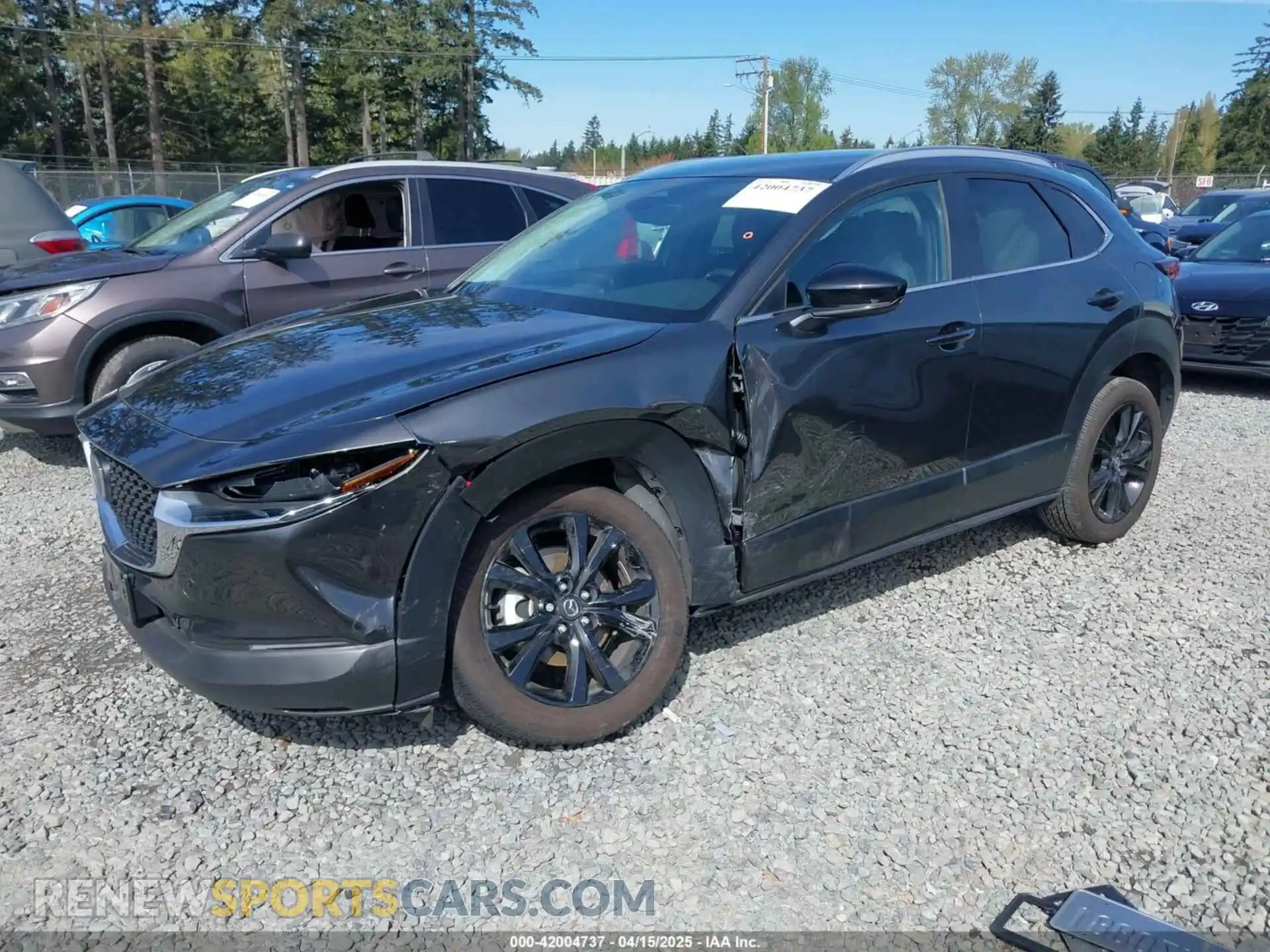 2 Photograph of a damaged car 3MVDMBBMXRM645958 MAZDA CX-30 2024