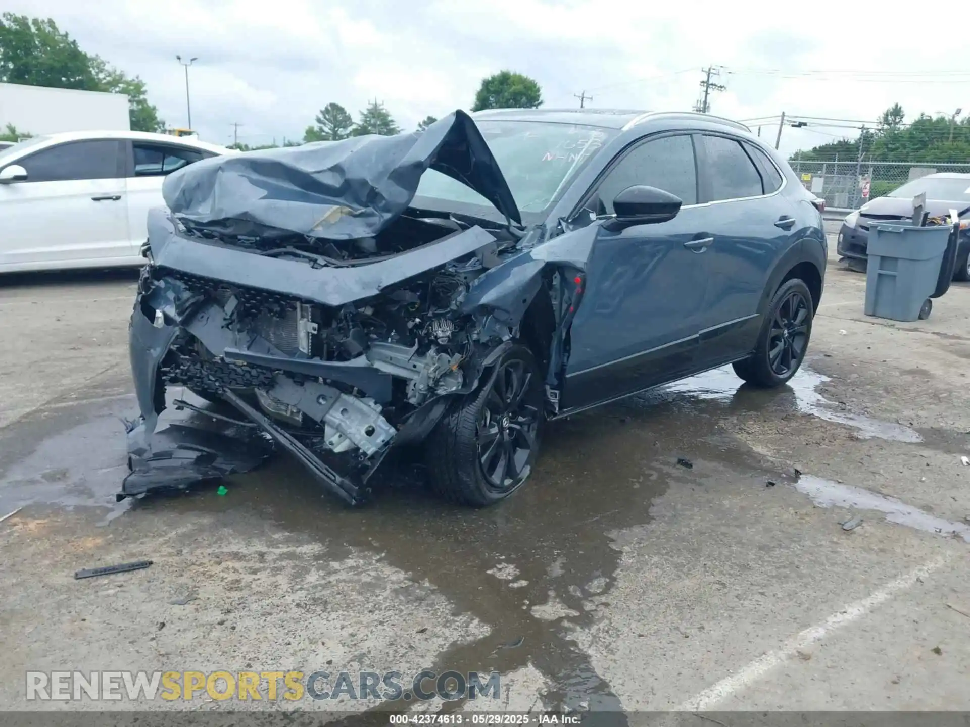 2 Photograph of a damaged car 3MVDMBCM3RM641653 MAZDA CX-30 2024