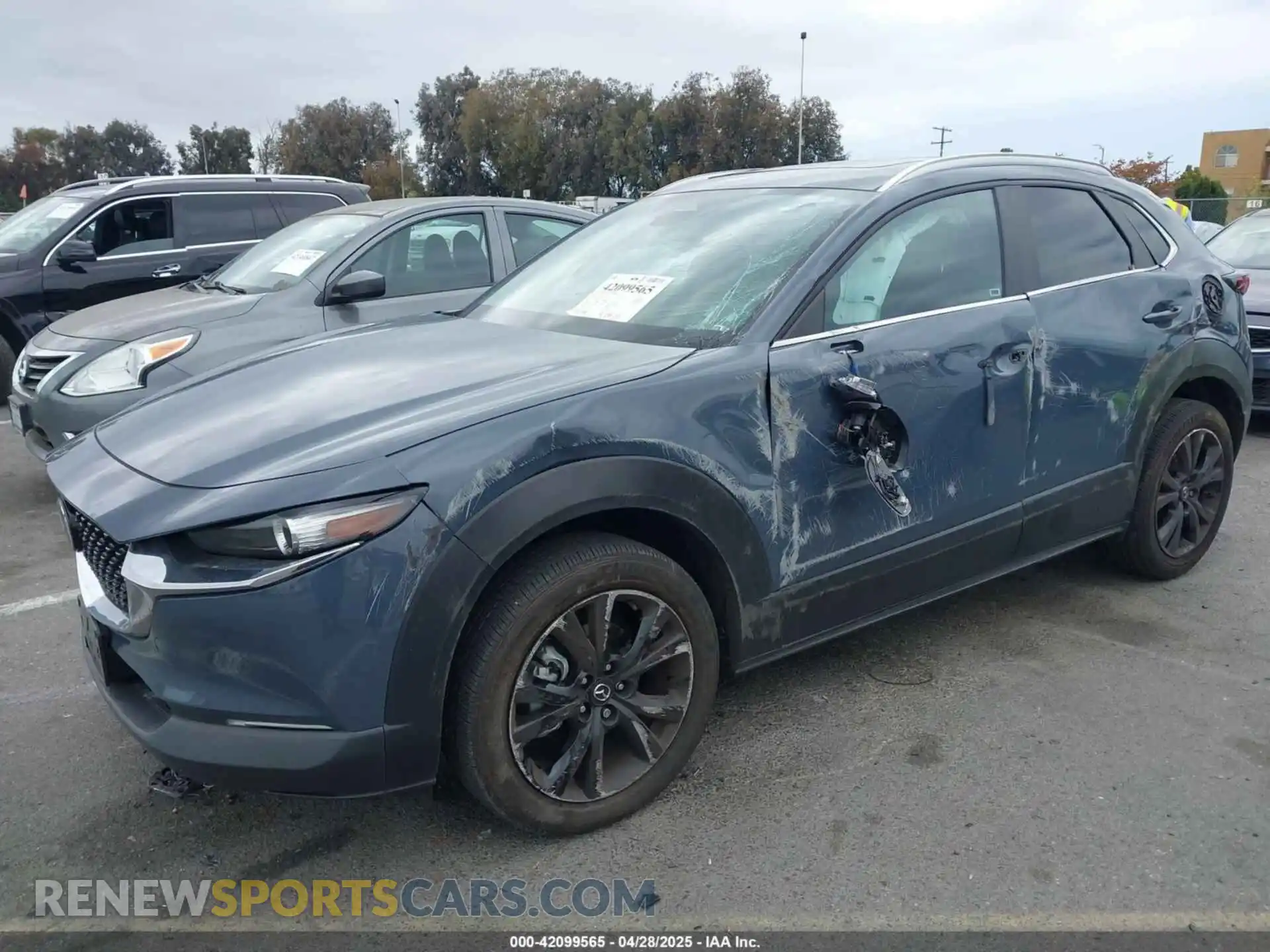 2 Photograph of a damaged car 3MVDMBCM9RM635307 MAZDA CX-30 2024