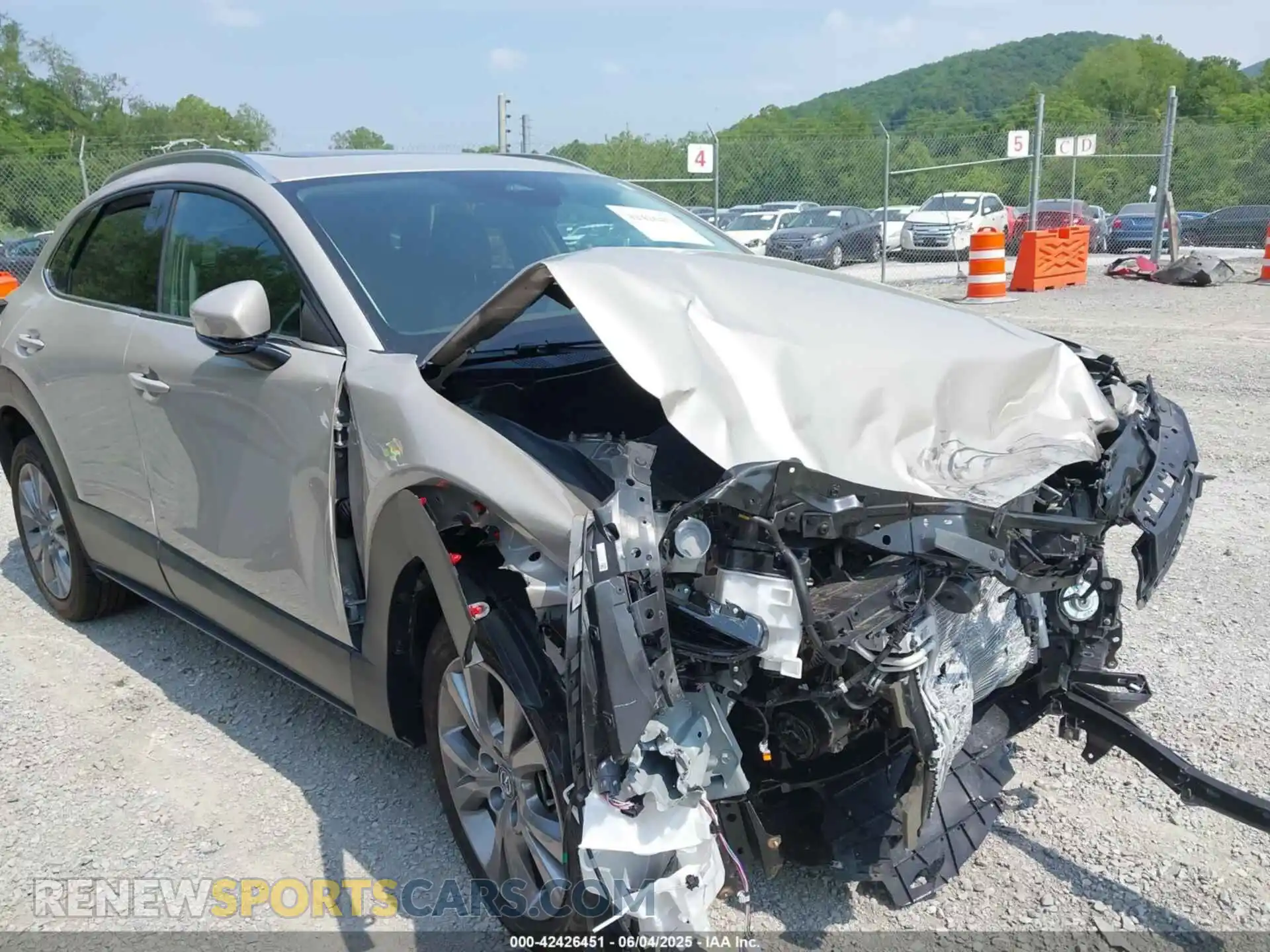 1 Photograph of a damaged car 3MVDMBDMXRM615226 MAZDA CX-30 2024