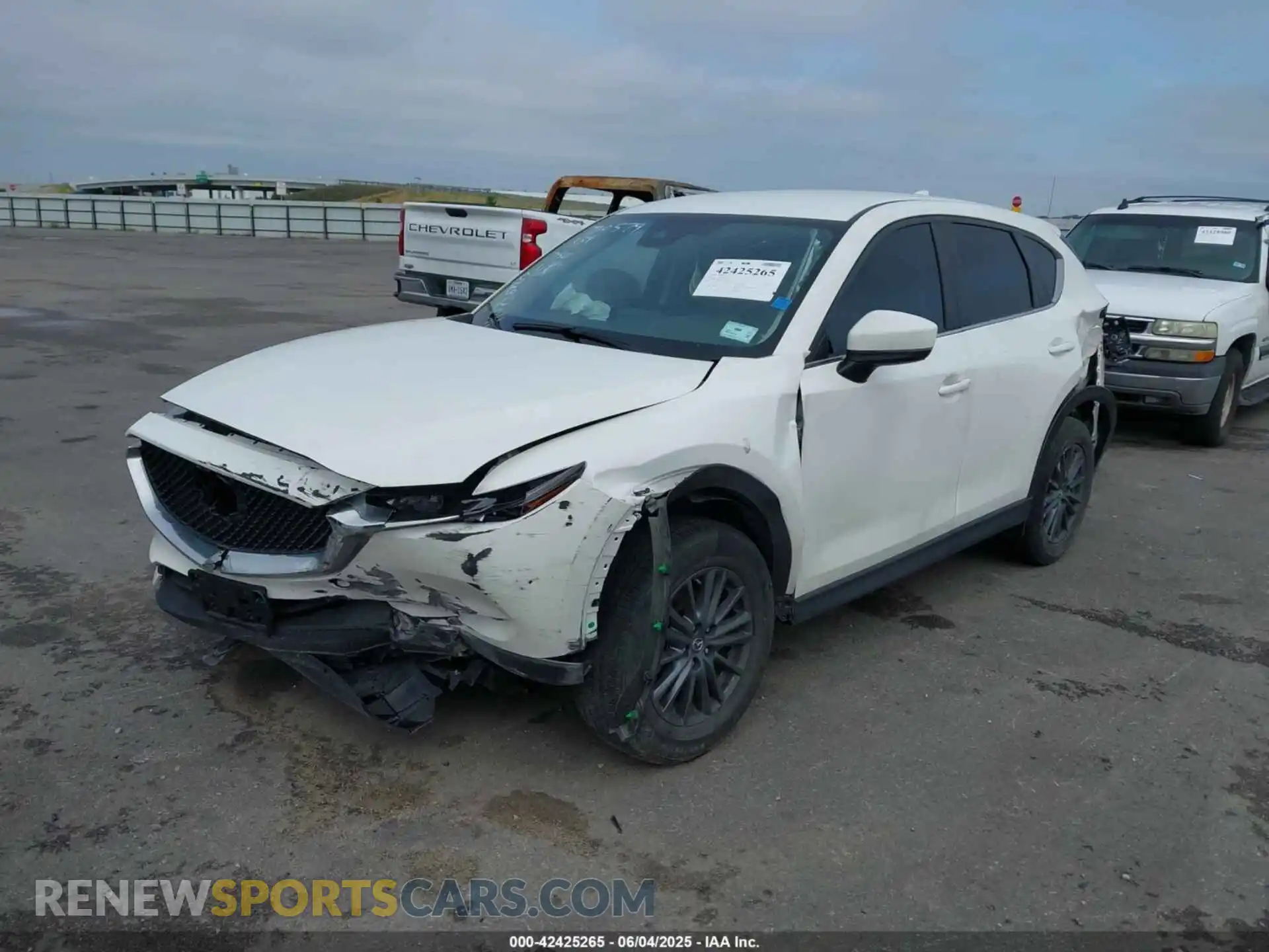 2 fotografías del automóvil dañado JM3KFABM6K0678744 MAZDA CX-5 2019
