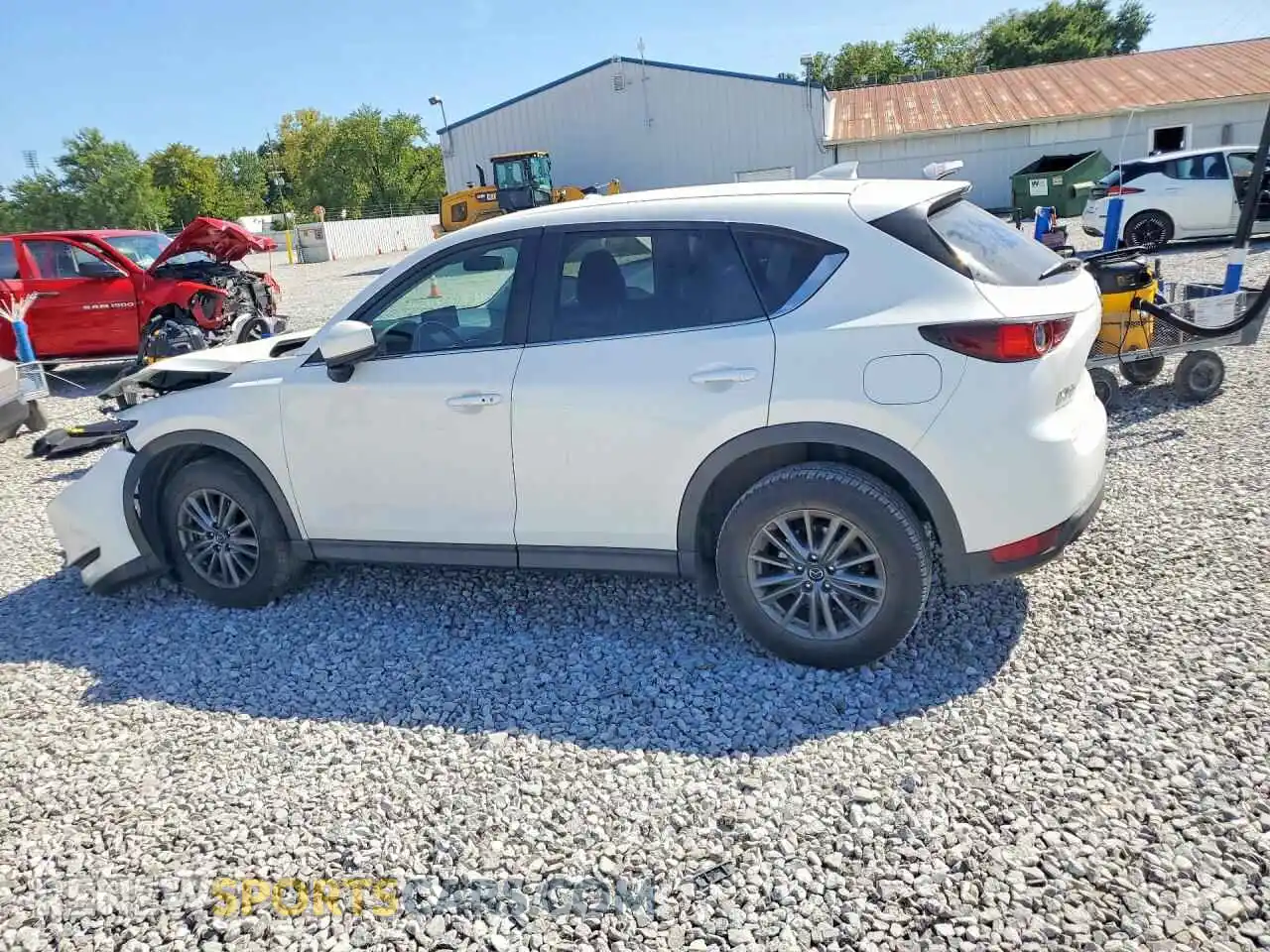 2 fotografías del automóvil dañado JM3KFACM1M0331274 MAZDA CX-5 2021