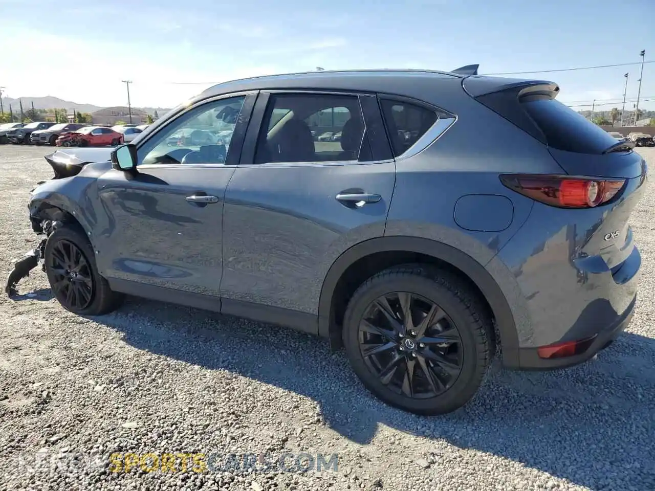 2 fotografías del automóvil dañado JM3KFACM1M0365876 MAZDA CX-5 2021
