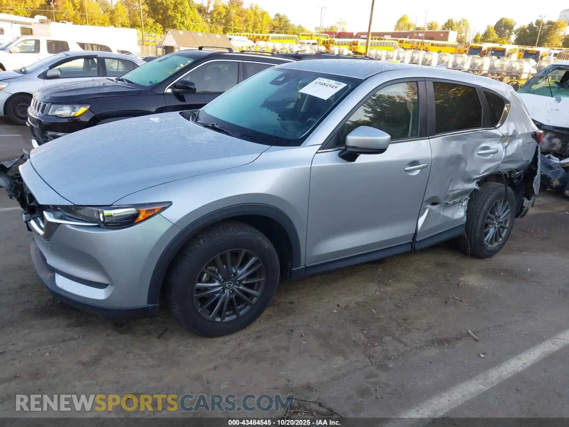 2 fotografías del automóvil dañado JM3KFACM2M0394657 MAZDA CX-5 2021