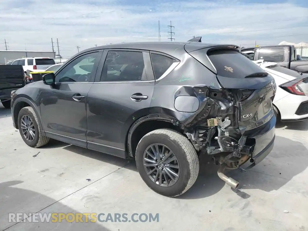 2 fotografías del automóvil dañado JM3KFACM5M1326685 MAZDA CX-5 2021