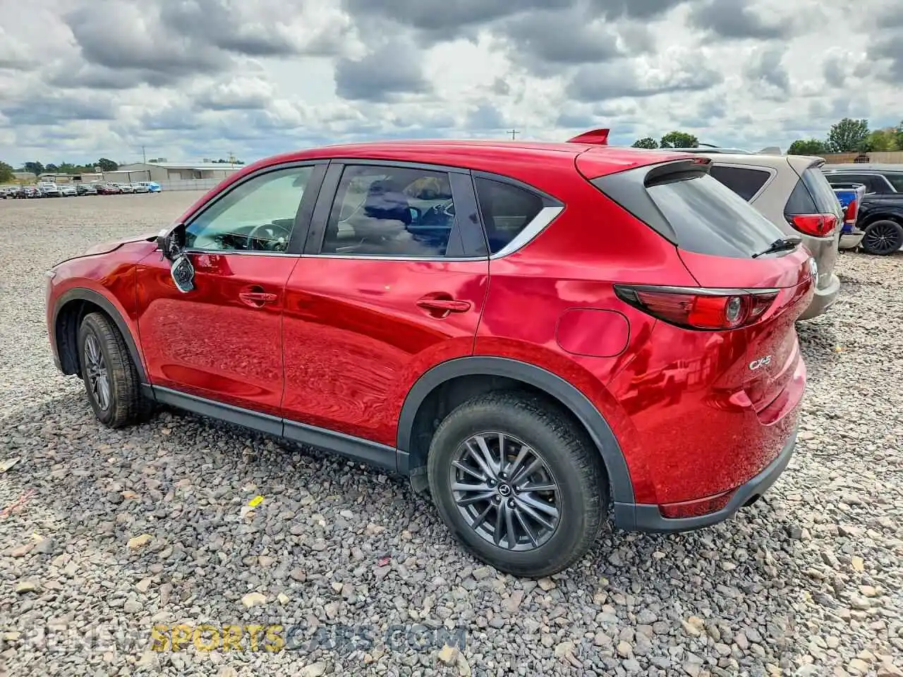 2 fotografías del automóvil dañado JM3KFACM7M0331022 MAZDA CX-5 2021