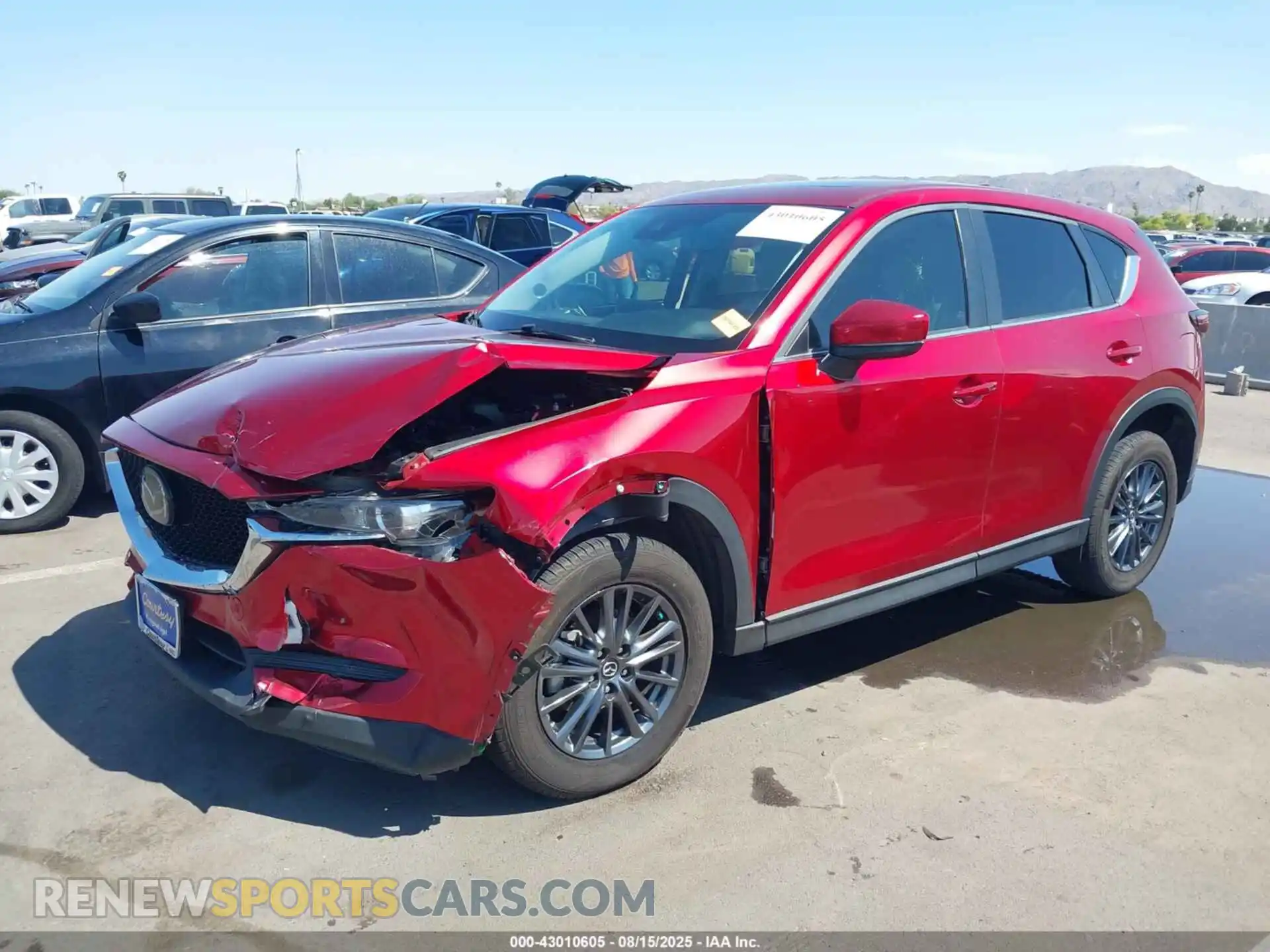 2 fotografías del automóvil dañado JM3KFACM7M0416751 MAZDA CX-5 2021