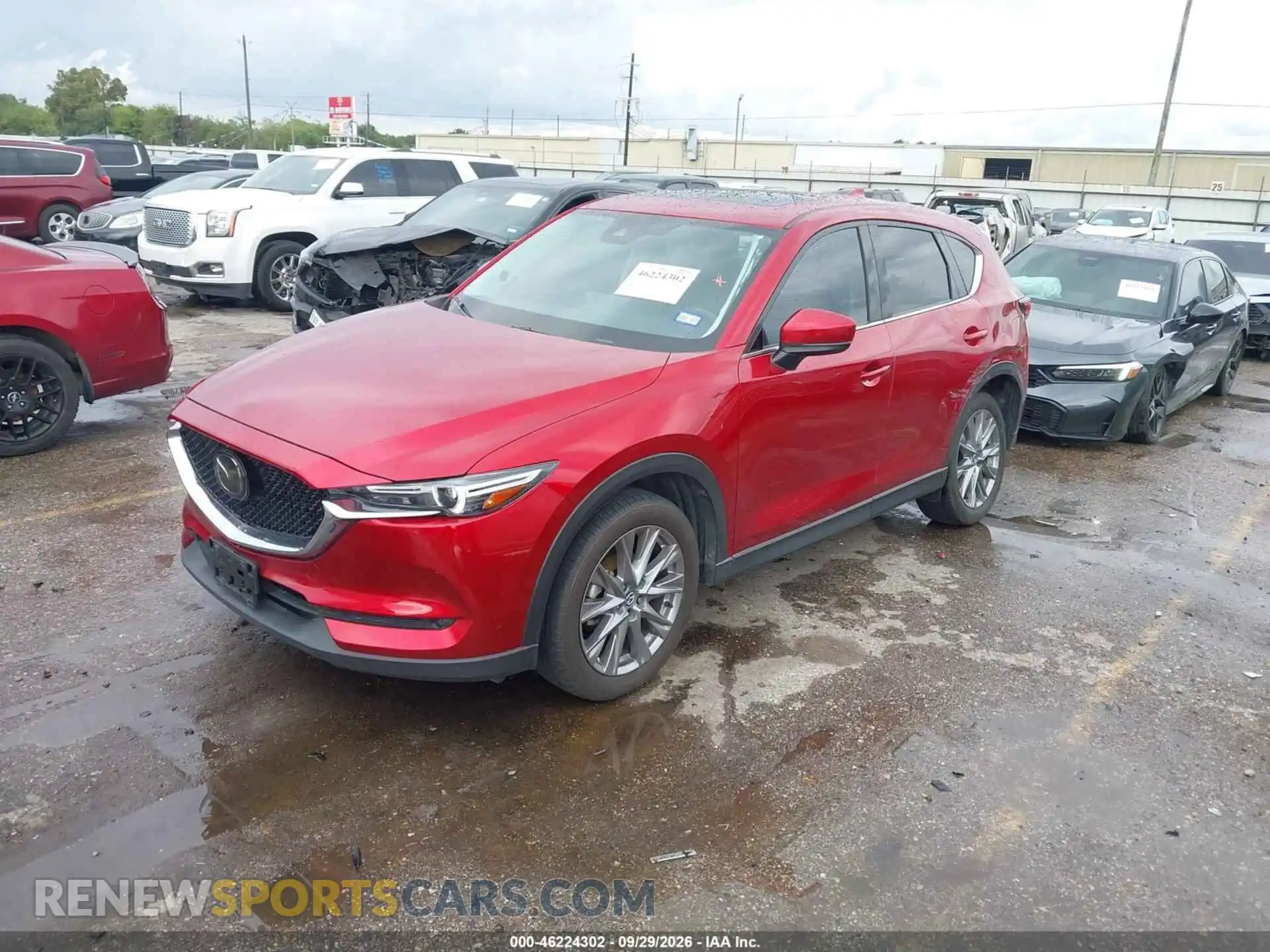 2 fotografías del automóvil dañado JM3KFADM1M0333394 MAZDA CX-5 2021