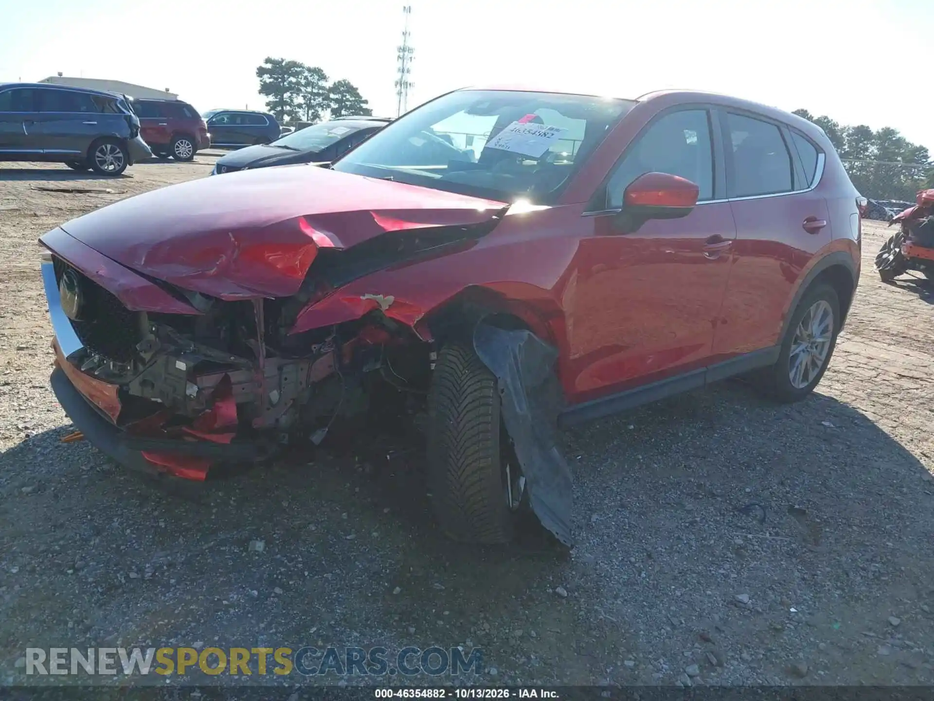 2 fotografías del automóvil dañado JM3KFADM3M0412582 MAZDA CX-5 2021