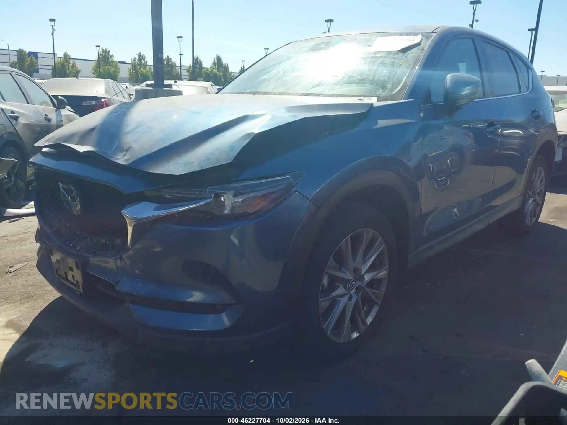 2 fotografías del automóvil dañado JM3KFADMXM0405158 MAZDA CX-5 2021