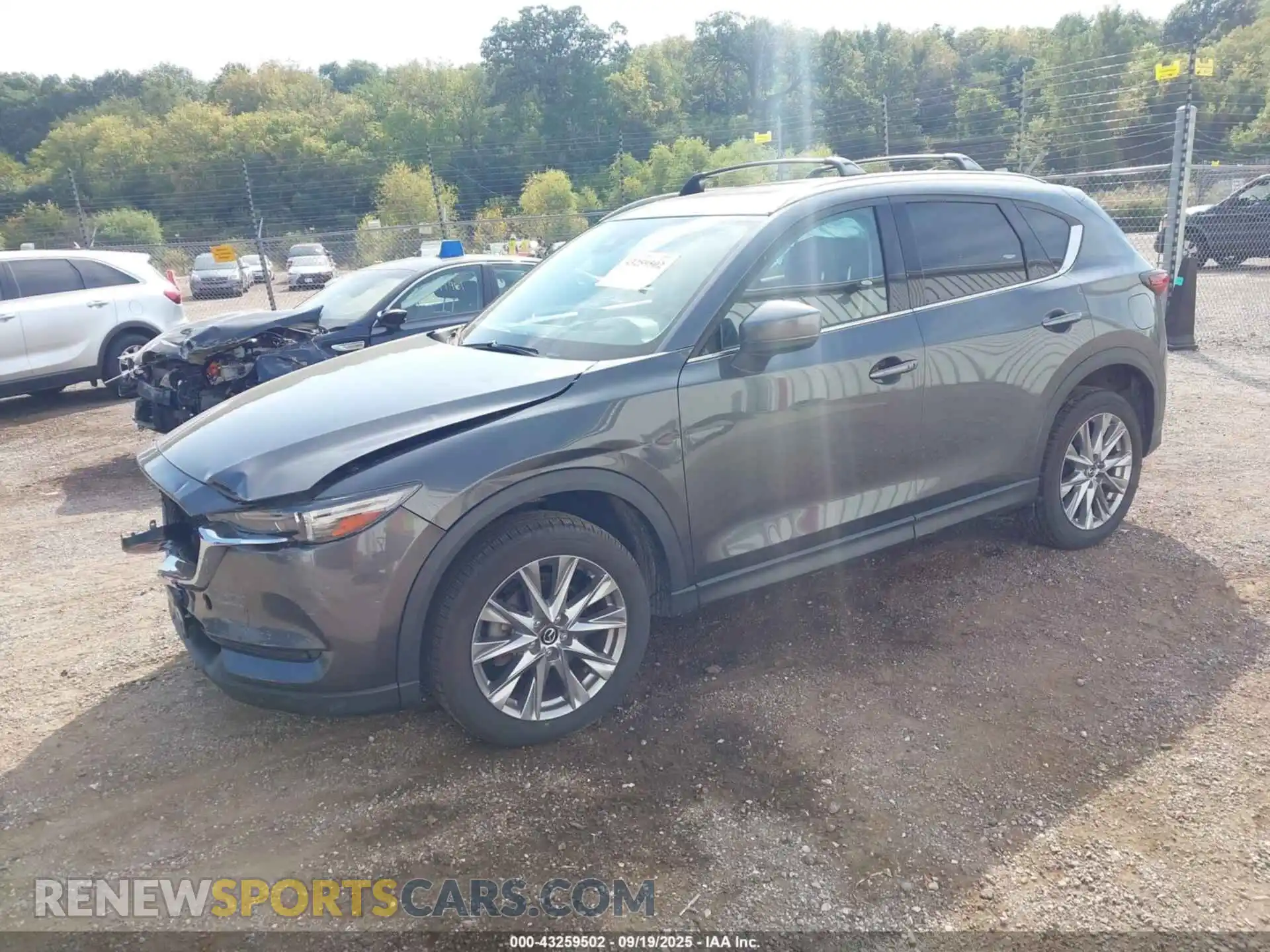 2 fotografías del automóvil dañado JM3KFBAY3M0304489 MAZDA CX-5 2021