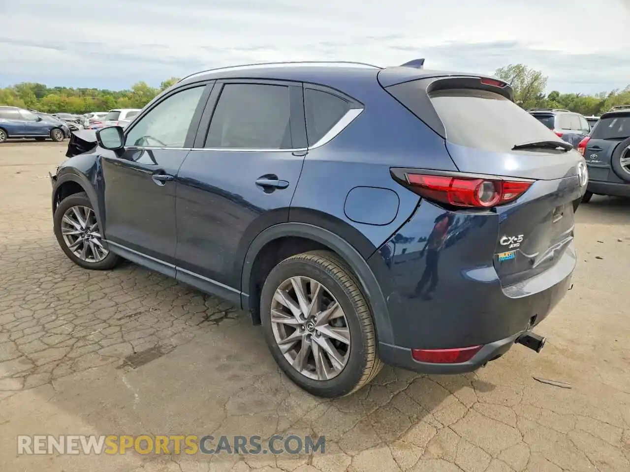 2 fotografías del automóvil dañado JM3KFBAY3M0381962 MAZDA CX-5 2021