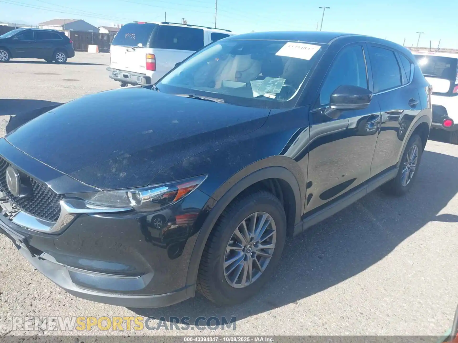 2 fotografías del automóvil dañado JM3KFBCM1M0441604 MAZDA CX-5 2021