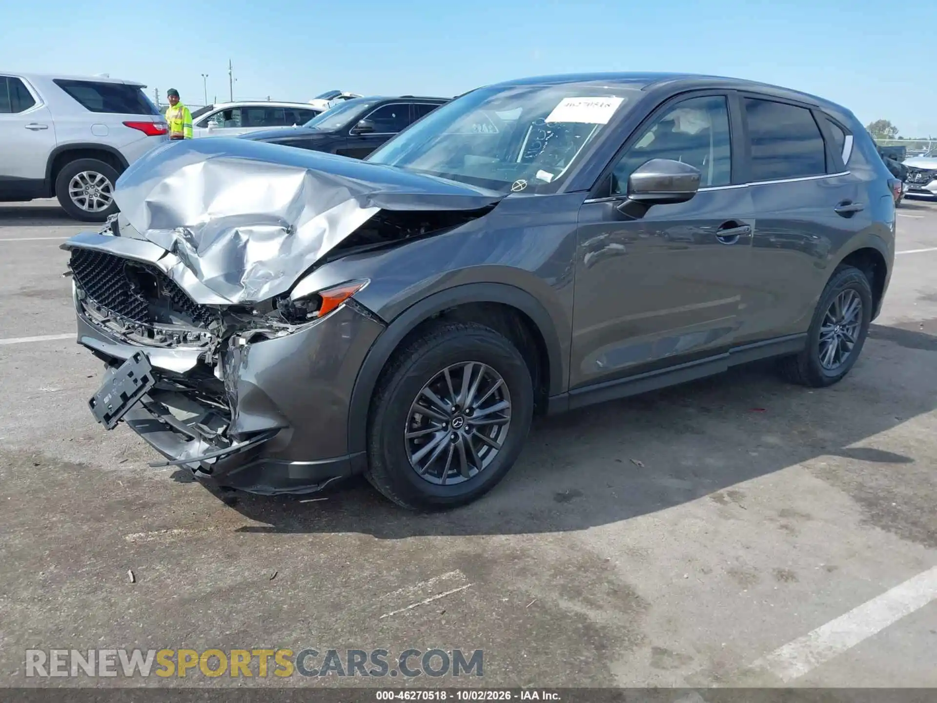 2 fotografías del automóvil dañado JM3KFBCM9M0461356 MAZDA CX-5 2021