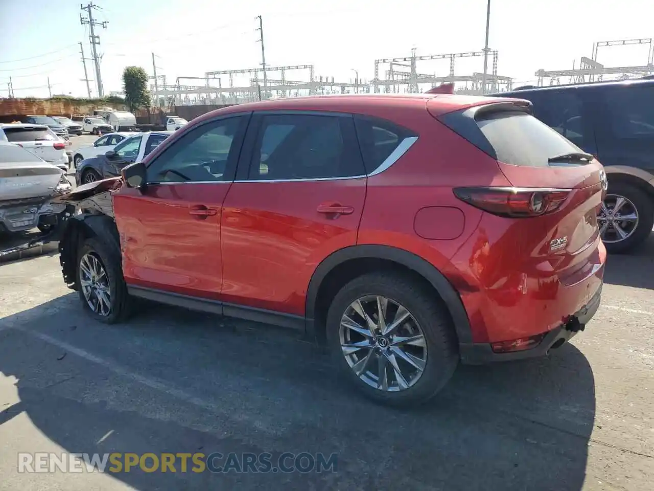2 fotografías del automóvil dañado JM3KFBEY5M0347080 MAZDA CX-5 2021