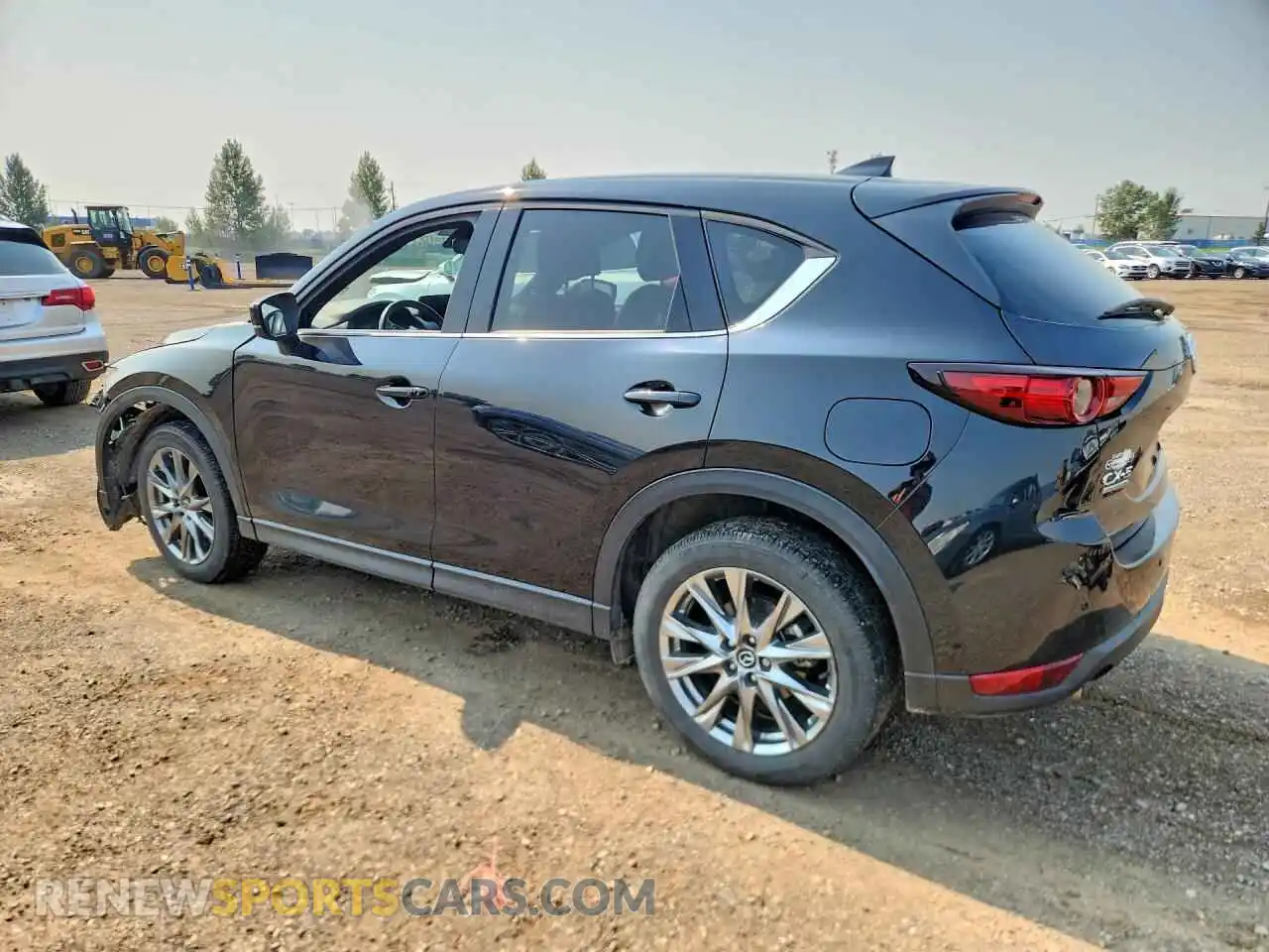 2 fotografías del automóvil dañado JM3KFBEY6M0102465 MAZDA CX-5 2021