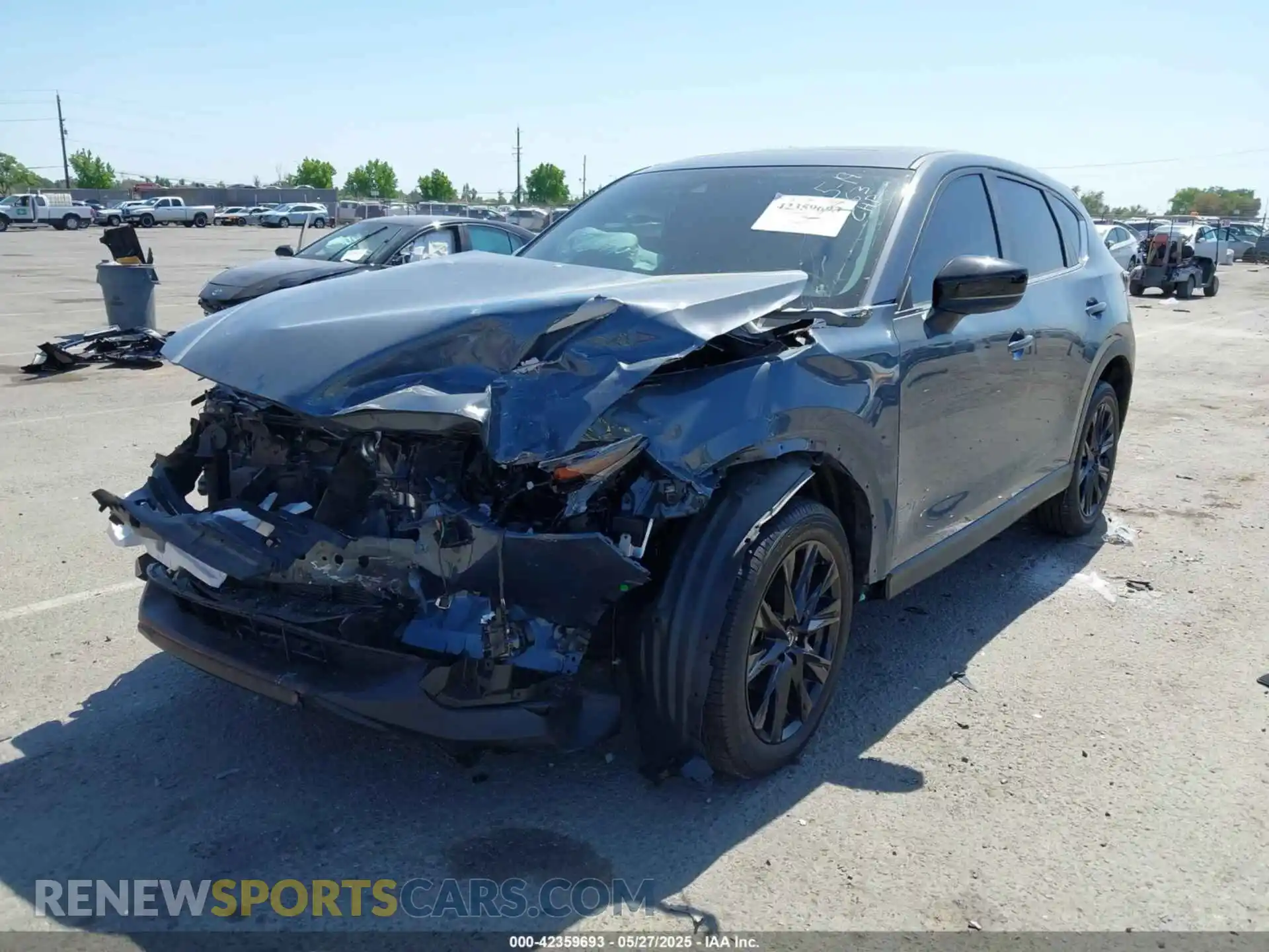 2 fotografías del automóvil dañado JM3KFBCM9P0155990 MAZDA CX-5 2023