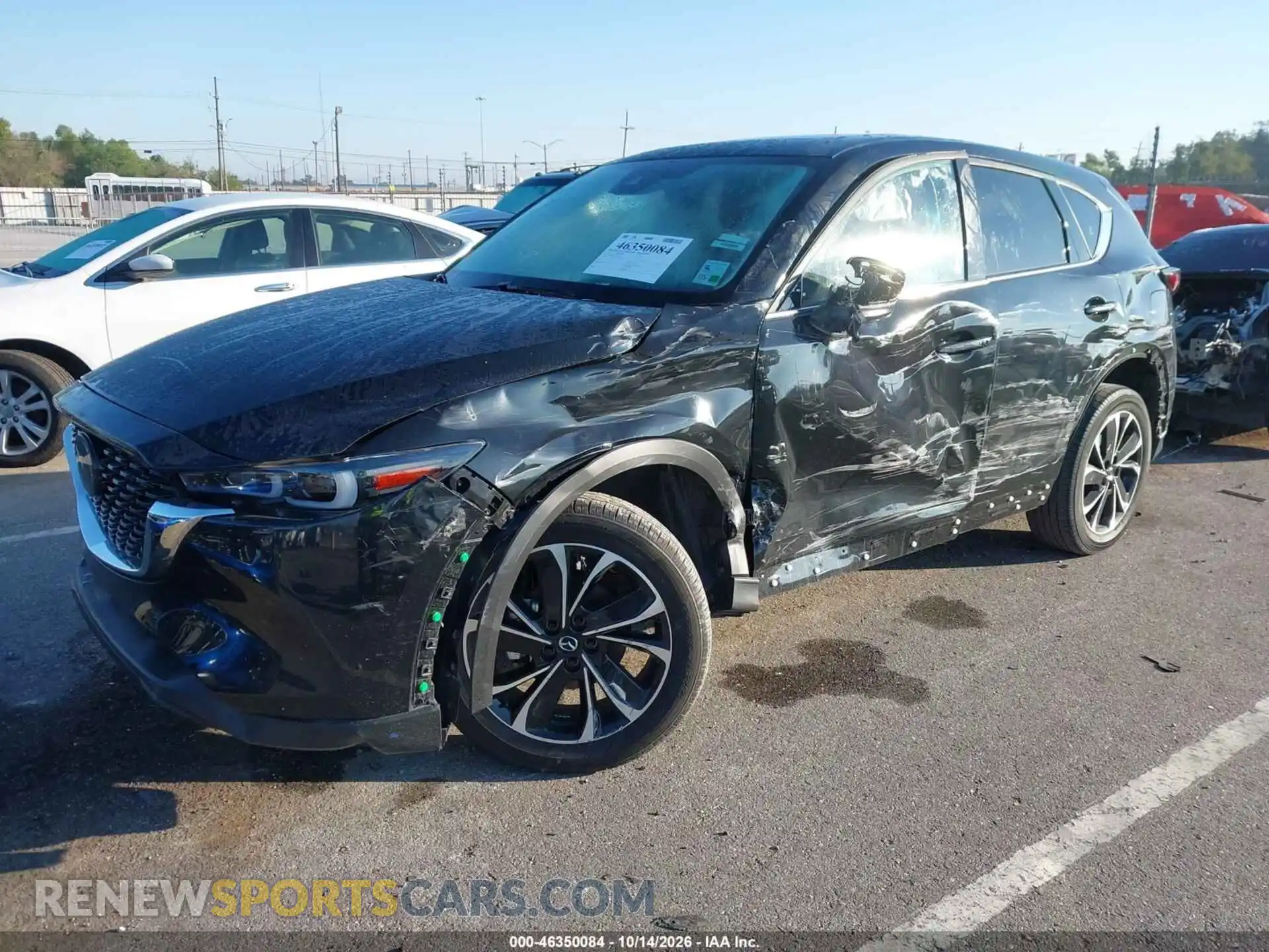 2 fotografías del automóvil dañado JM3KFBDM3P0133482 MAZDA CX-5 2023