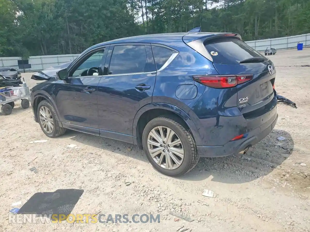 2 Photograph of a damaged car JM3KFBXY9P0123456 MAZDA CX-5 2023