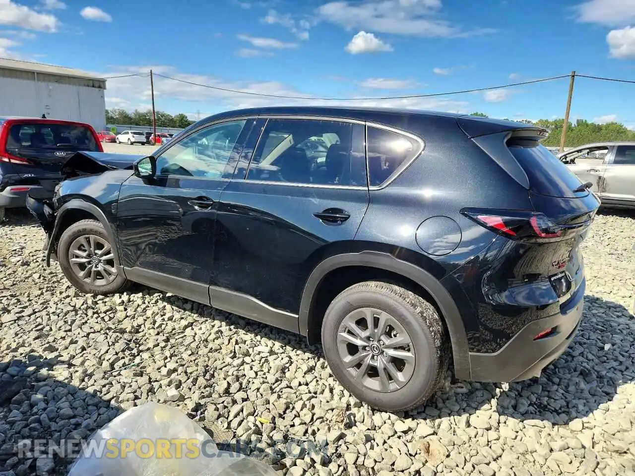 2 fotografías del automóvil dañado JM3KMBHA0T0127901 MAZDA CX-5 2026