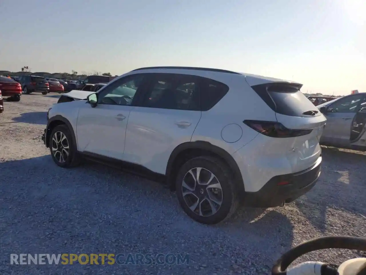 2 fotografías del automóvil dañado JM3KMCHA4T0129608 MAZDA CX-5 2026