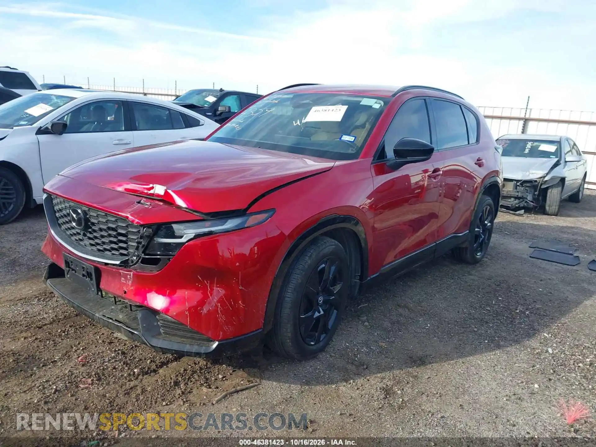 2 fotografías del automóvil dañado JM3KMEHA1T0124359 MAZDA CX-5 2026