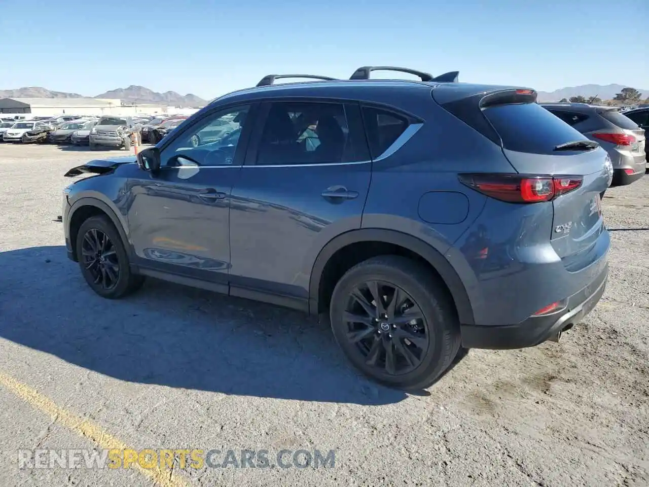 2 fotografías del automóvil dañado JM3KFBCM6P0280641 MAZDA CX-5 PREFE 2023