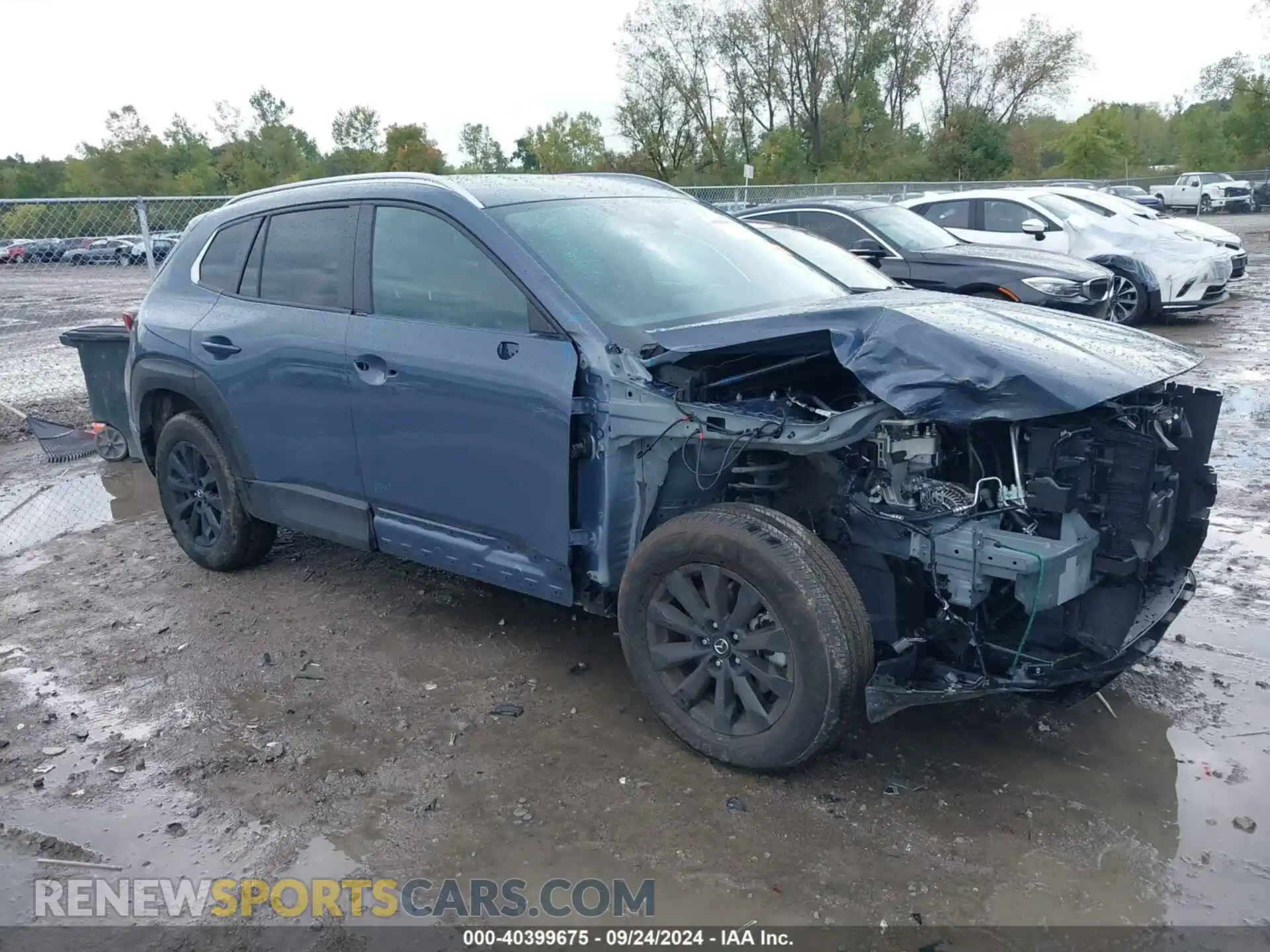 1 Photograph of a damaged car 7MMVABAM9RN203355 MAZDA CX-50 2024