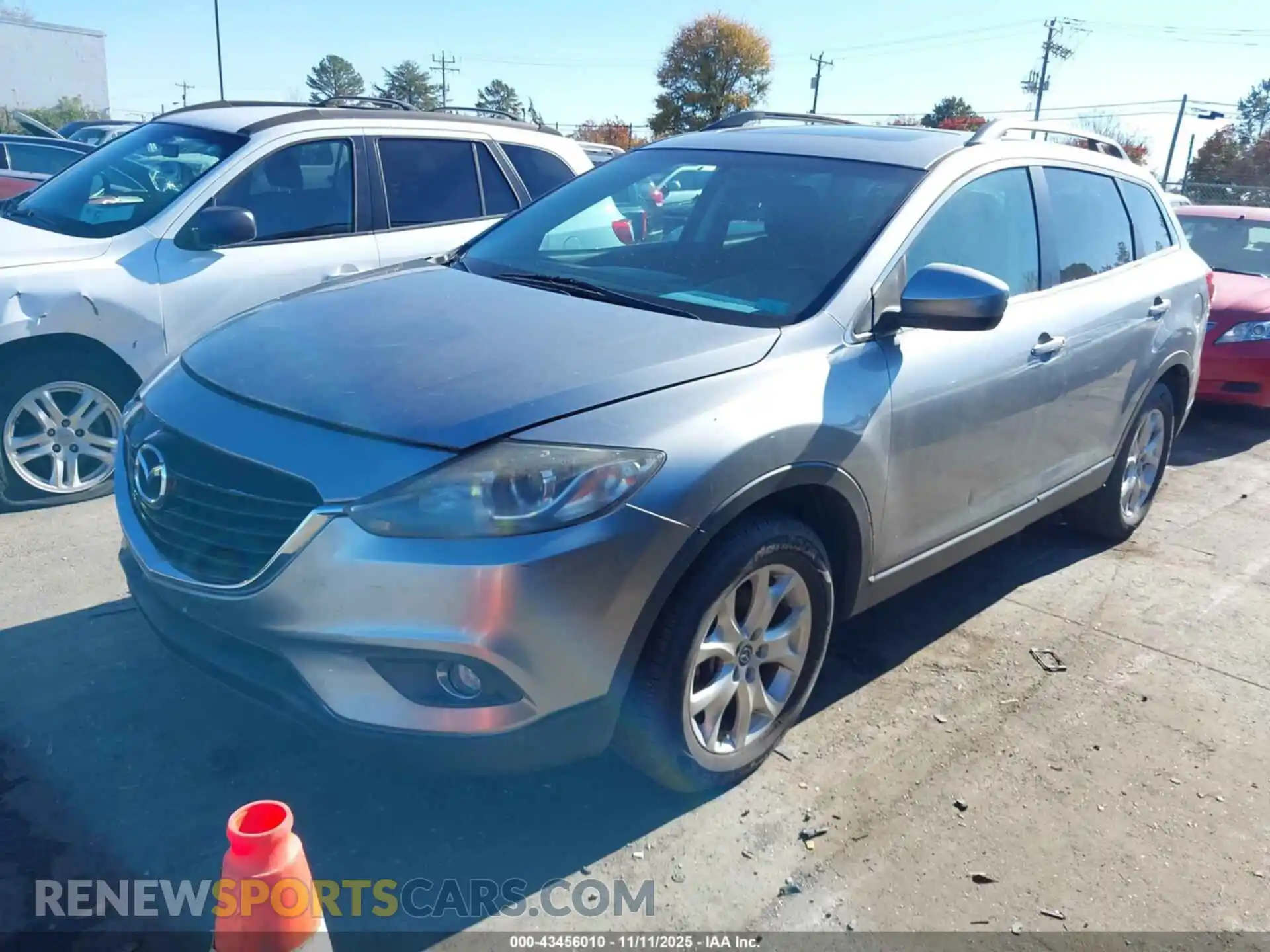 2 fotografías del automóvil dañado JM3TCACY3M0503885 MAZDA CX-9 2021