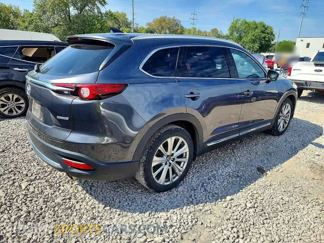 3 Photograph of a damaged car JM3TCBEY0N0611899 MAZDA CX-9 2022