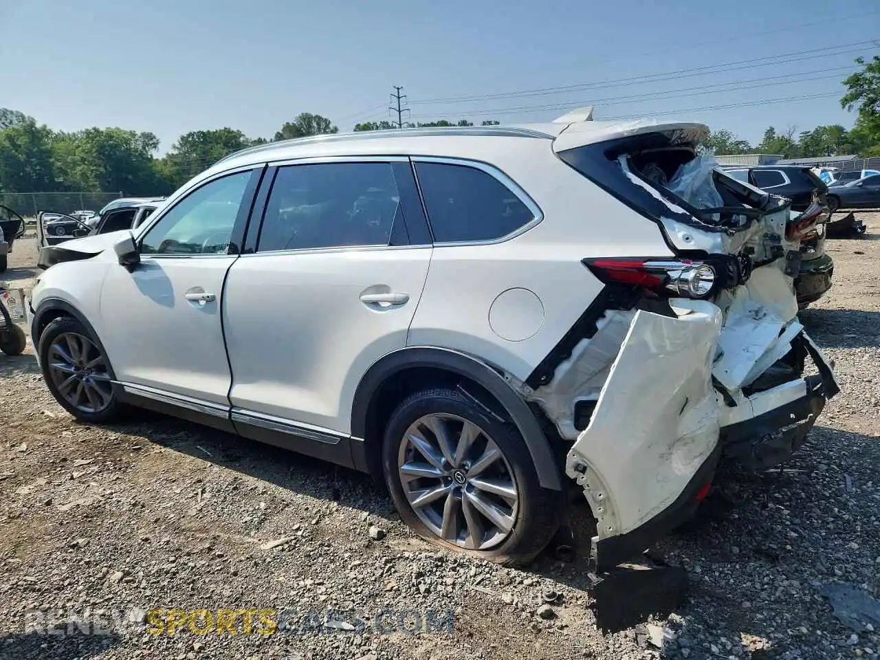 2 fotografías del automóvil dañado JM3TCBDY7P0632835 MAZDA CX-9 2023