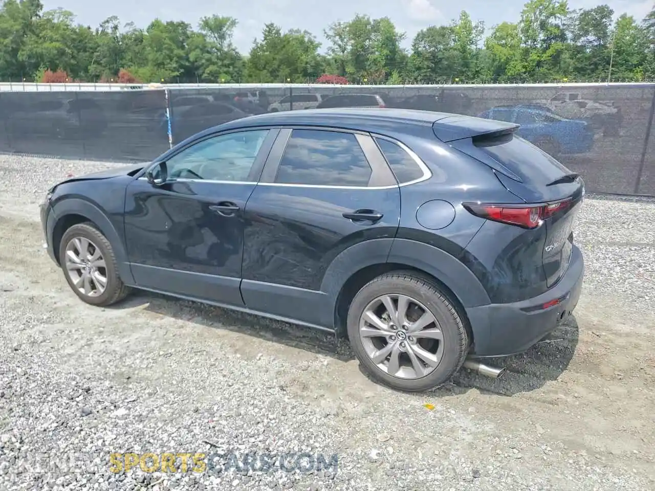 2 fotografías del automóvil dañado 3MVDMABL6MM309038 MAZDA CX30 2021