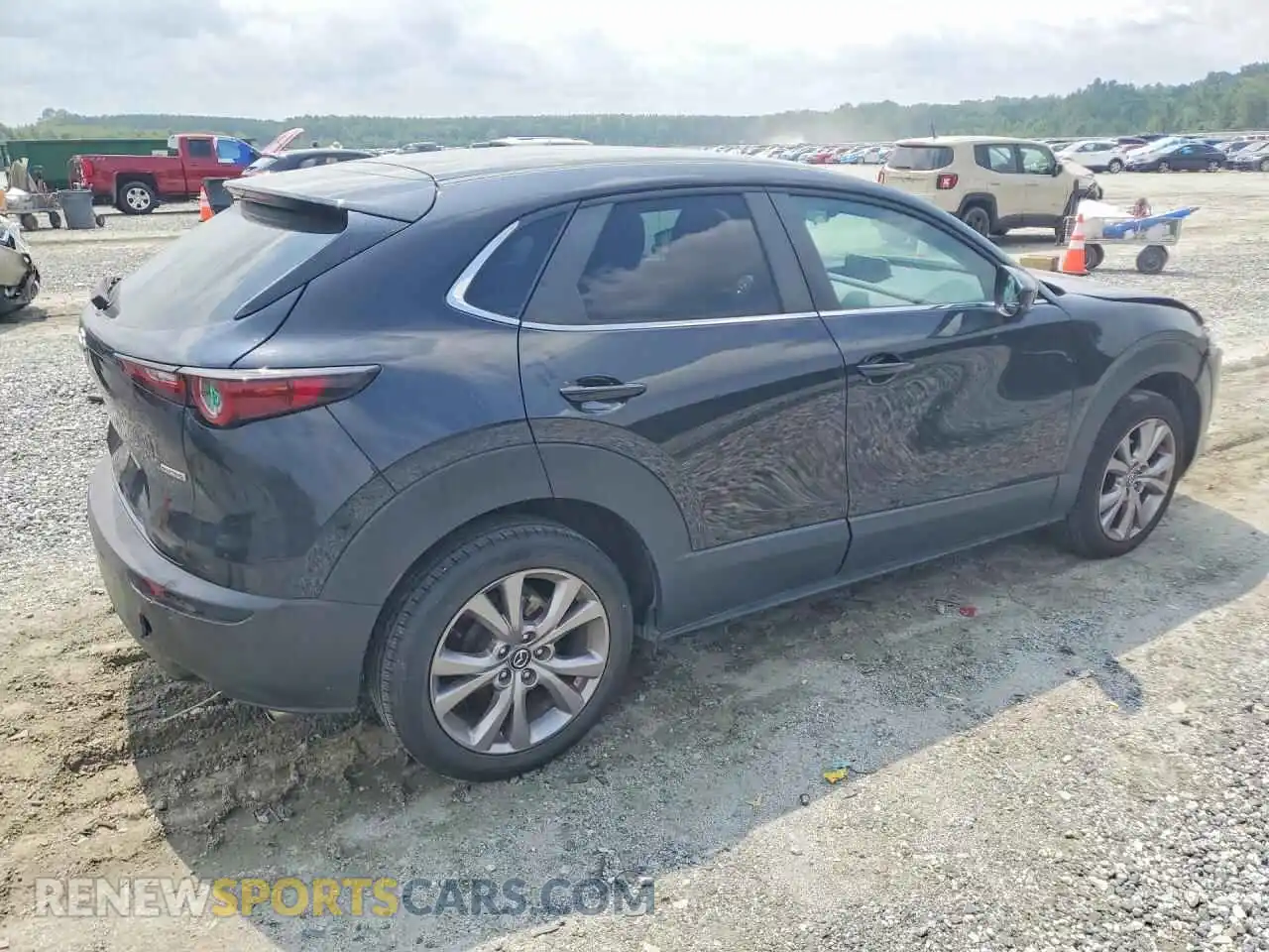 3 fotografías del automóvil dañado 3MVDMABL6MM309038 MAZDA CX30 2021