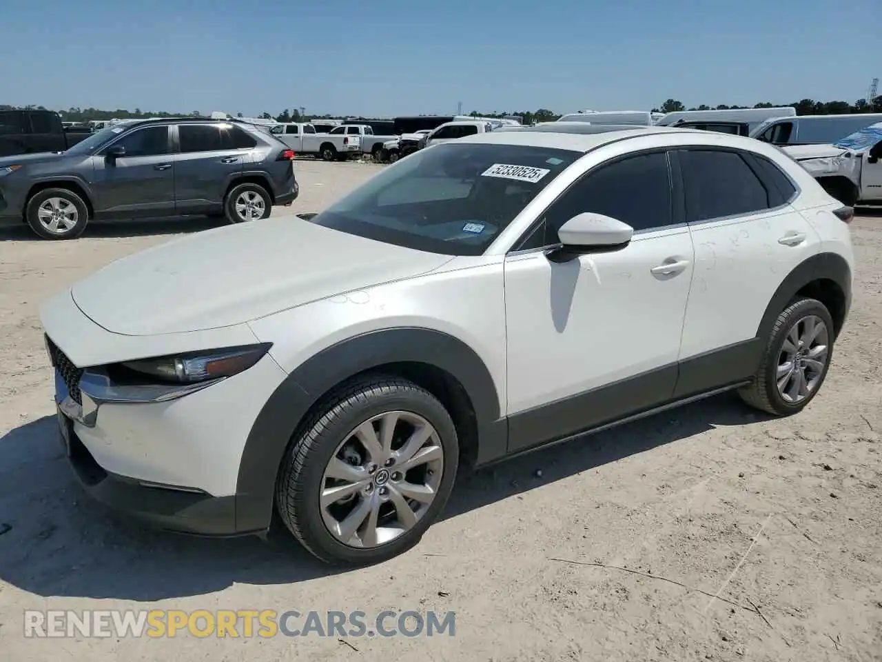1 Photograph of a damaged car 3MVDMACL4MM208868 MAZDA CX30 2021