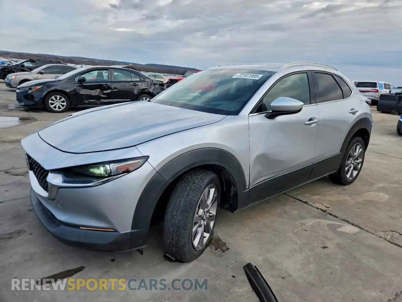 1 Photograph of a damaged car 3MVDMADM5MM216761 MAZDA CX30 2021