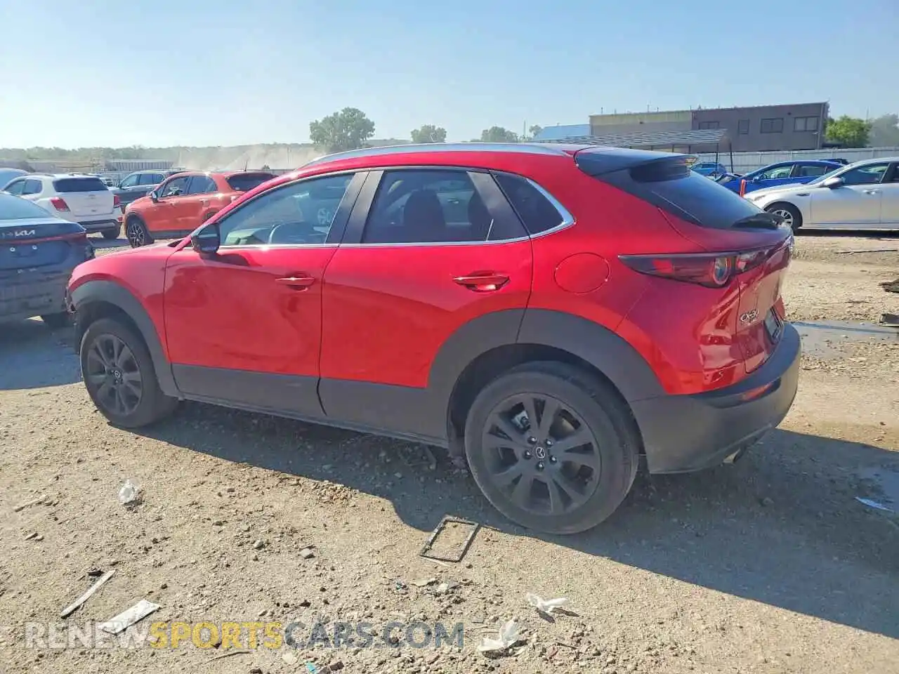 2 fotografías del automóvil dañado 3MVDMBAY5MM309292 MAZDA CX30 2021