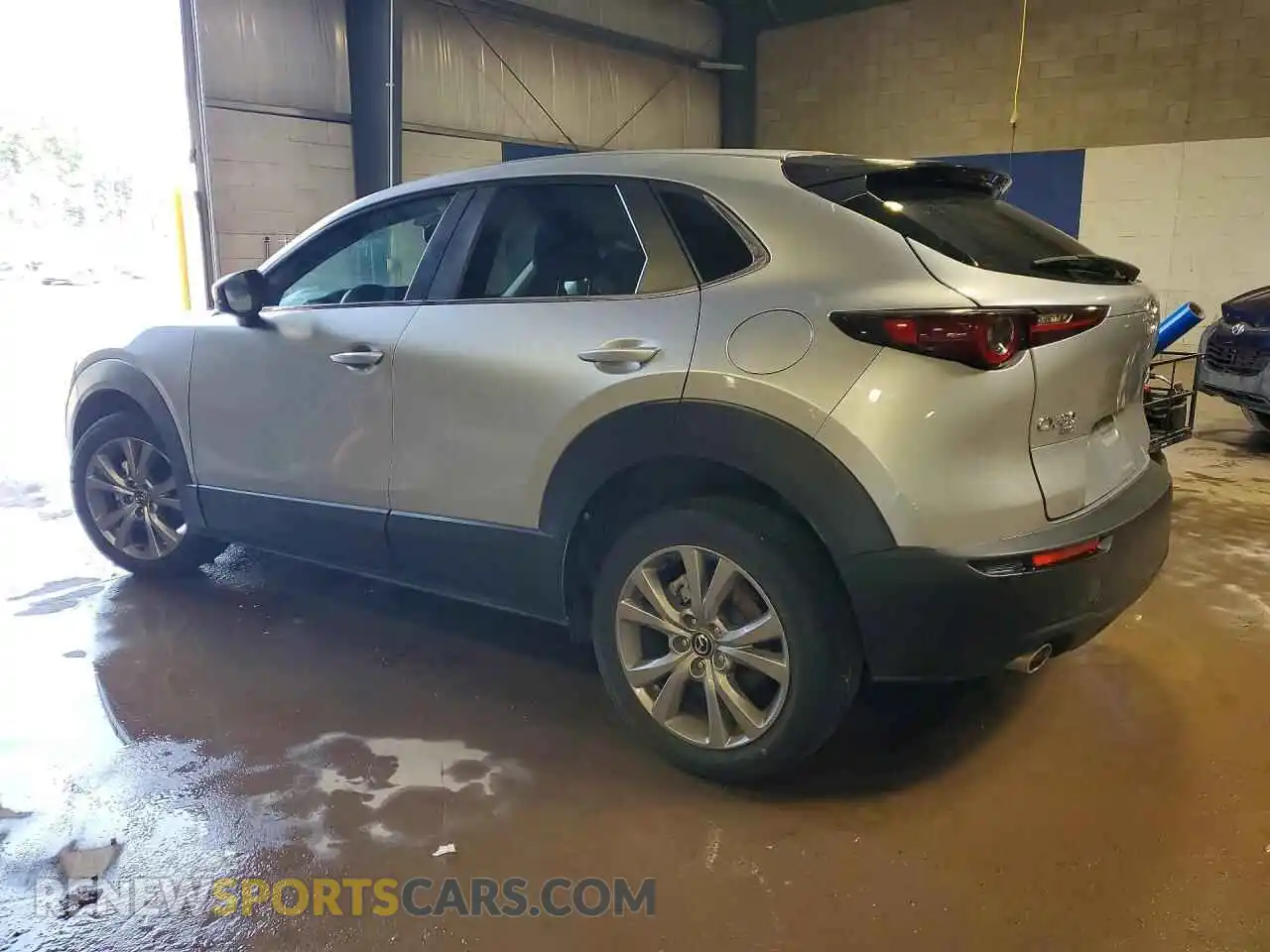 2 fotografías del automóvil dañado 3MVDMBBL4MM254062 MAZDA CX30 2021
