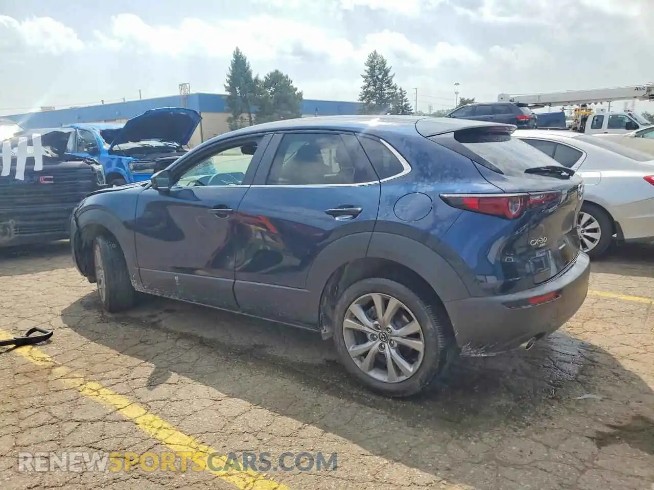2 fotografías del automóvil dañado 3MVDMBBL5MM316942 MAZDA CX30 2021