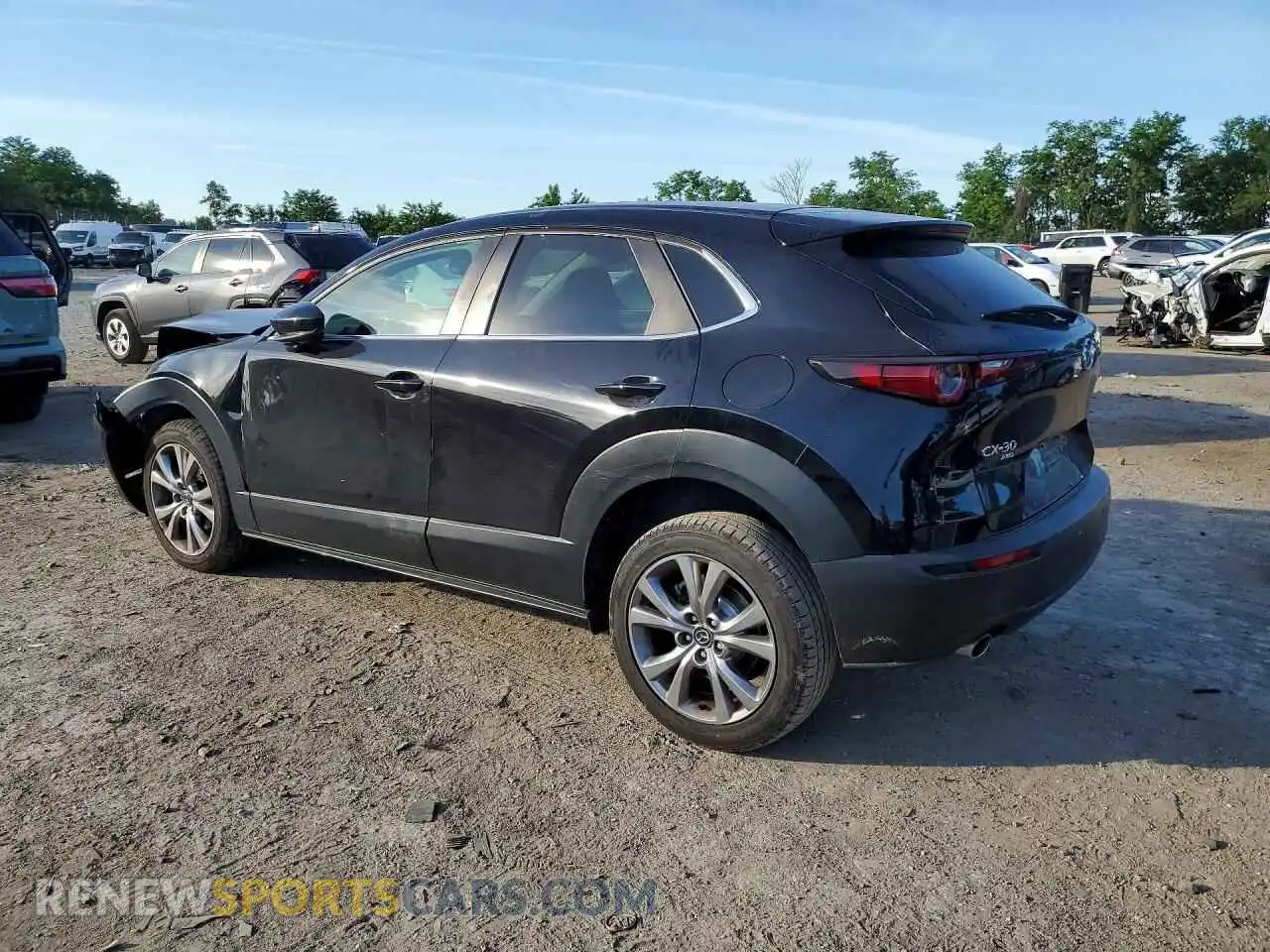2 fotografías del automóvil dañado 3MVDMBBL8MM242237 MAZDA CX30 2021