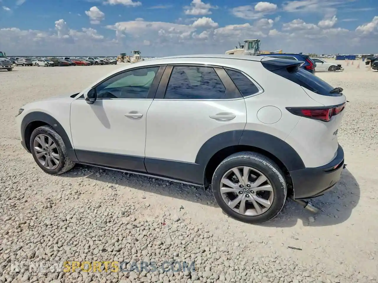 2 fotografías del automóvil dañado 3MVDMBBL9MM320203 MAZDA CX30 2021