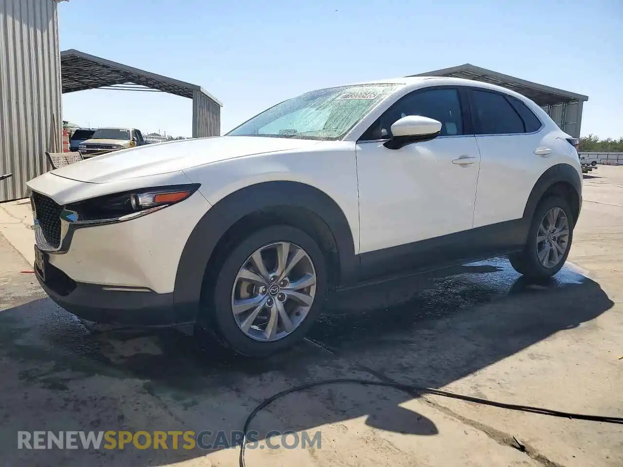 1 Photograph of a damaged car 3MVDMBBLXMM315284 MAZDA CX30 2021