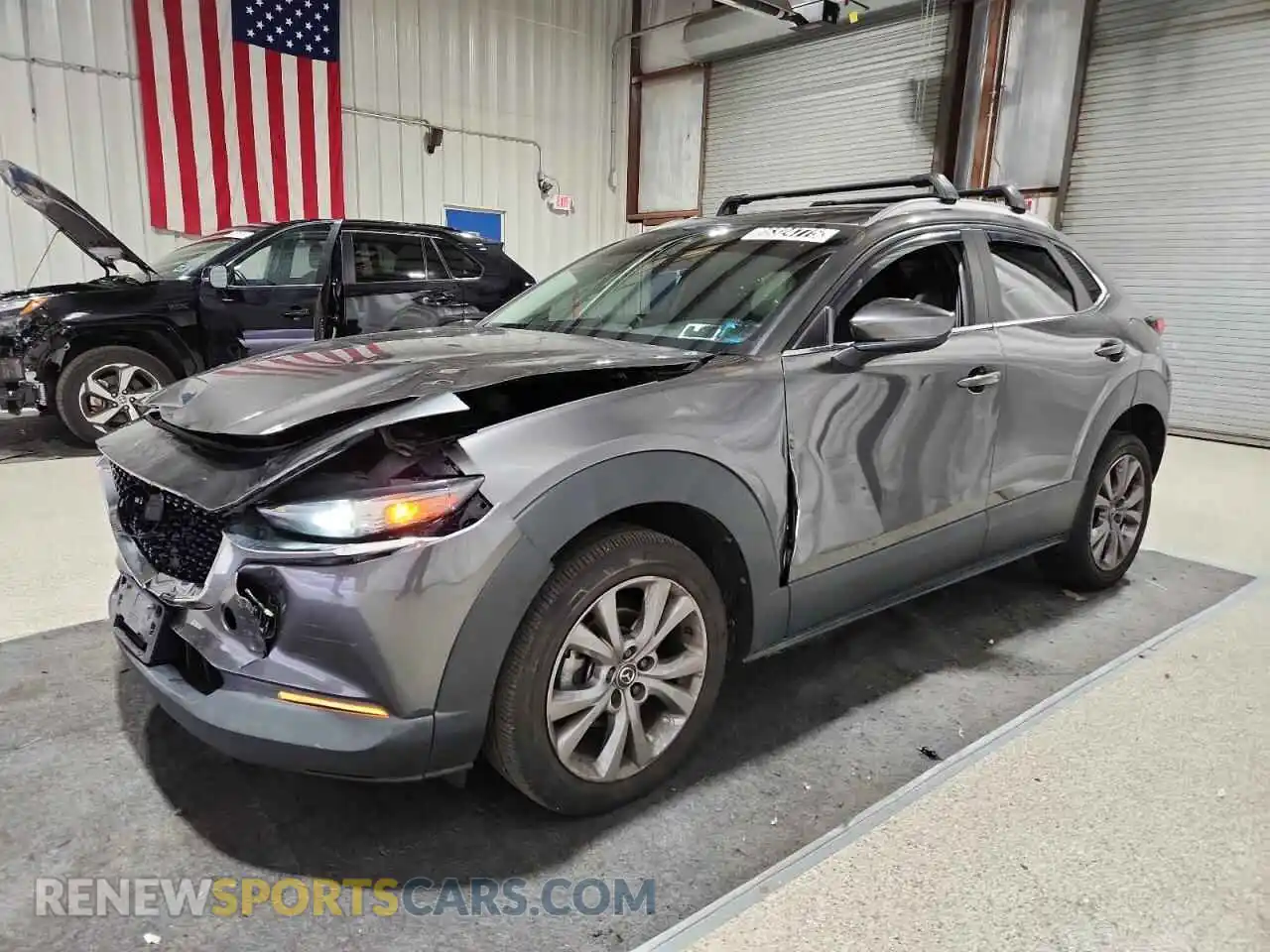 1 Photograph of a damaged car 3MVDMBCL2MM300860 MAZDA CX30 2021