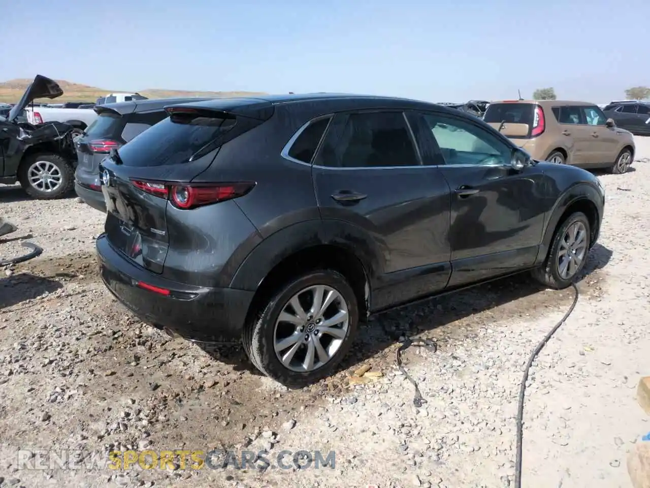 3 Фотография поврежденного автомобиля 3MVDMBCLXMM214017 MAZDA CX30 2021